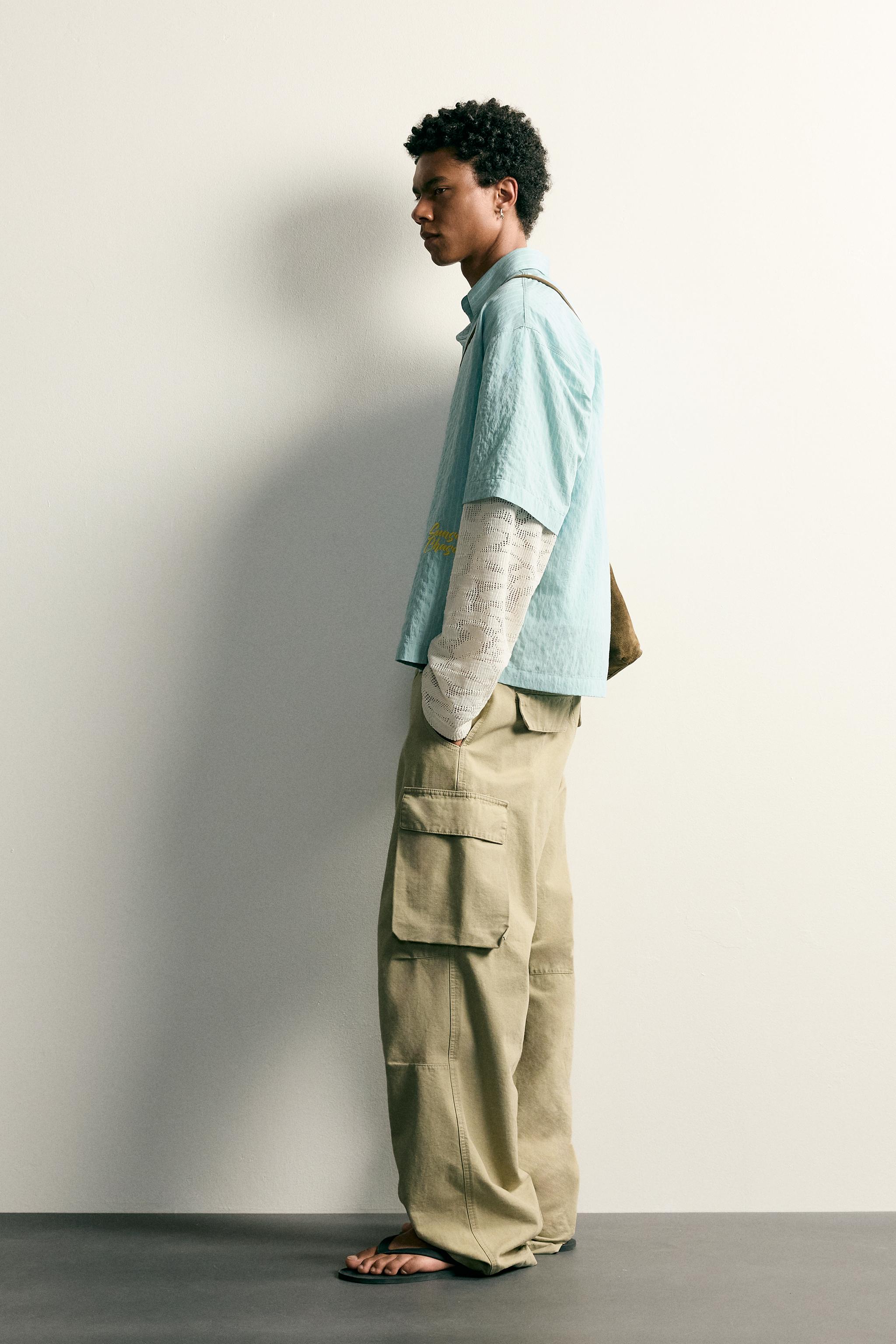 RELAXED FIT SHIRT WITH LAYERED SLEEVE DETAIL