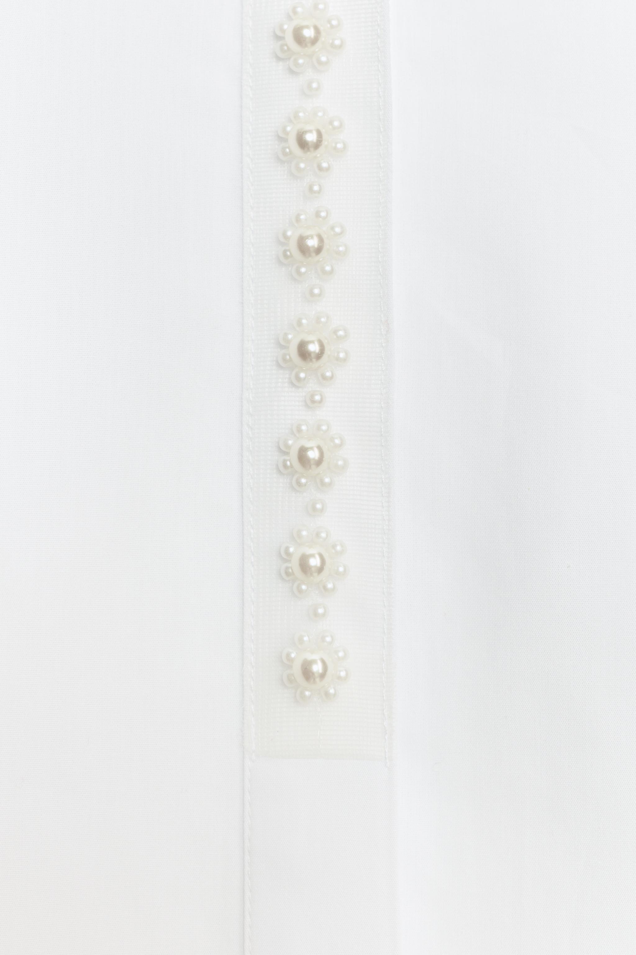 CHEMISE MANCHES COURTES À PERLES