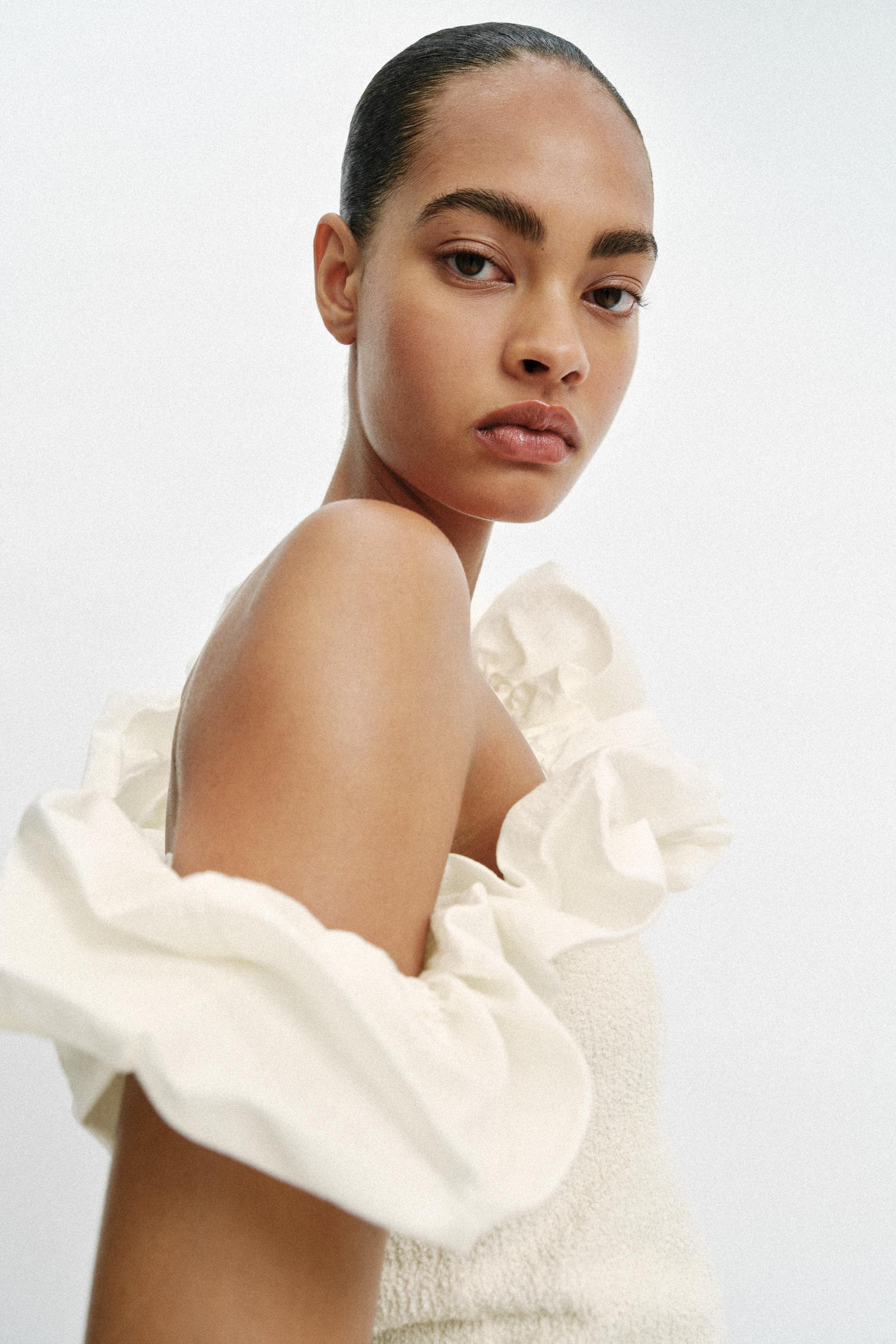 ASYMMETRIC BOUCLÉ TOP