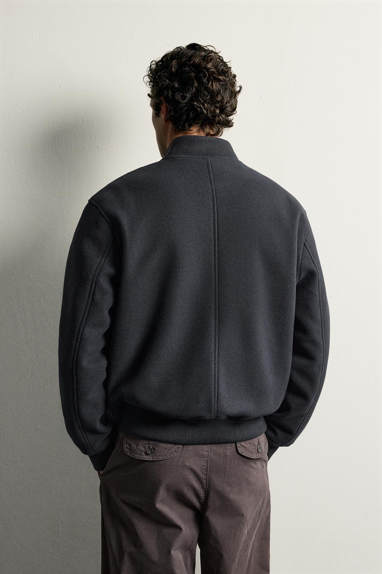 FAUX FUR INTERIOR BOMBER JACKET — Navy blue