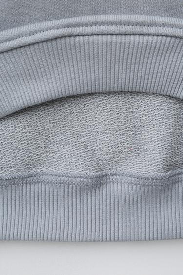 SWEAT À CAPUCHE NŒUD BARBIE™ MATTEL - Gris chiné de Zara - Image 3