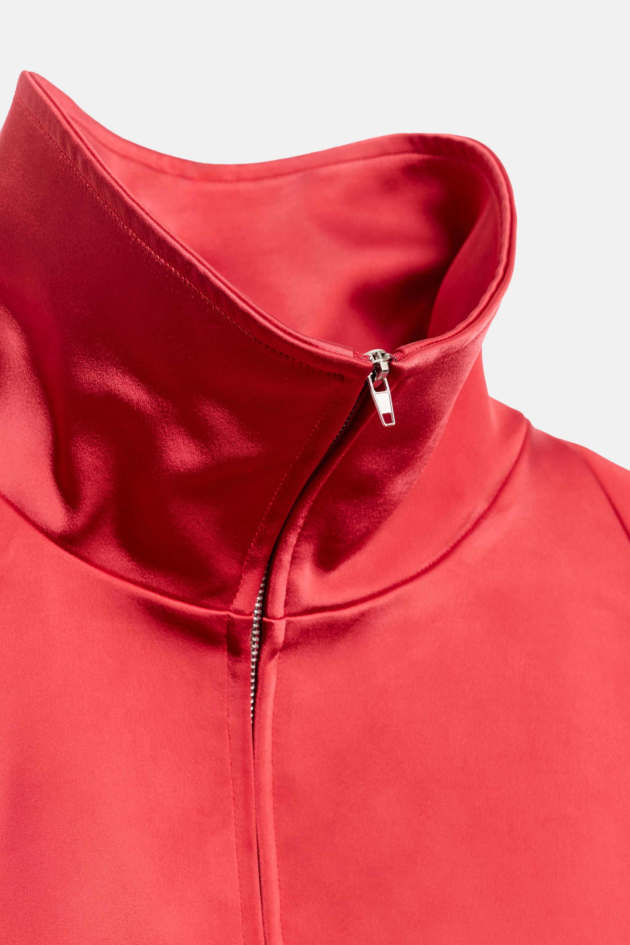 BLOUSON SATINÉ À ÉPAULETTE