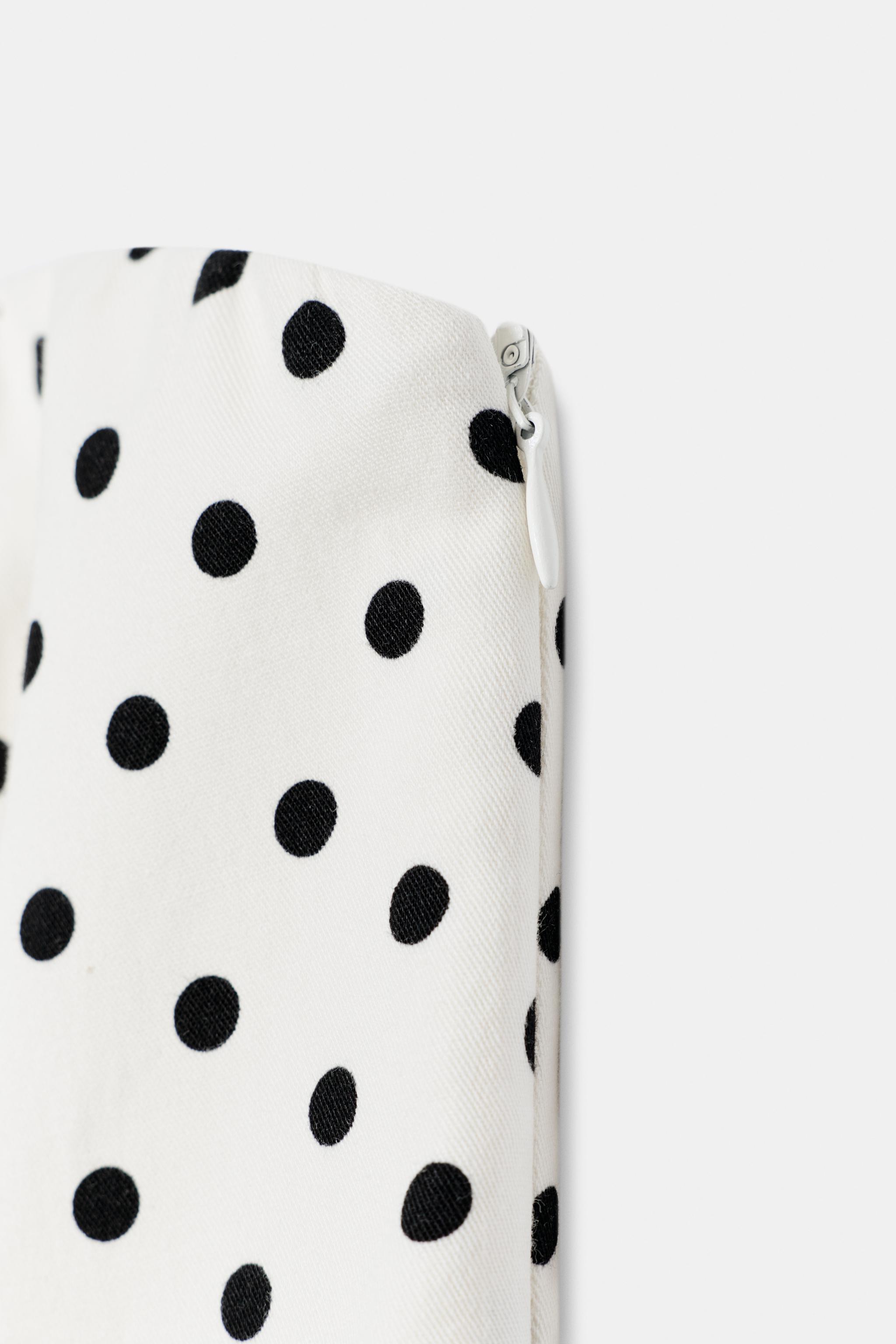 TOP BUSTIER PÉPLUM À POIS