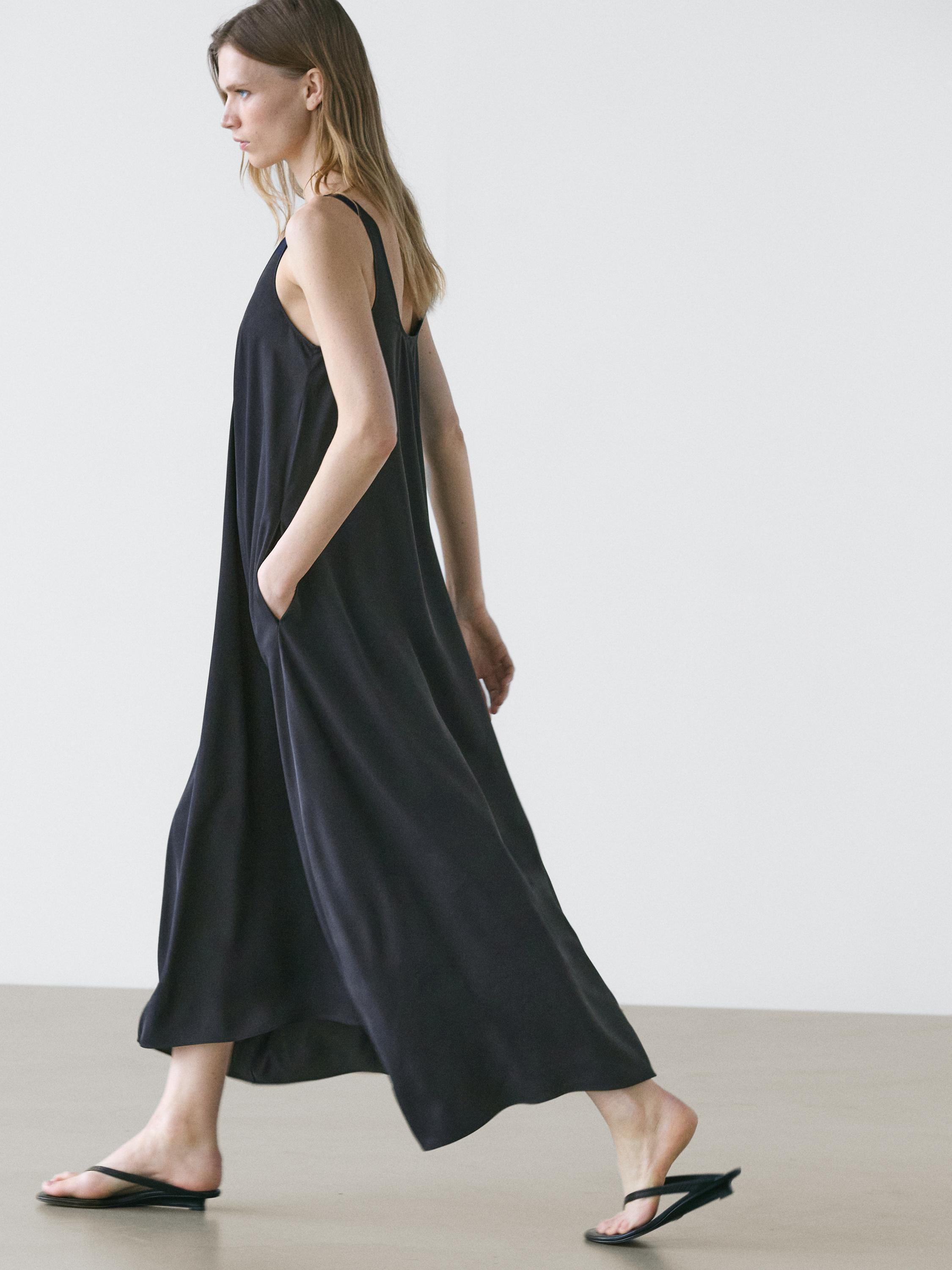 Flowing flared dress with straps