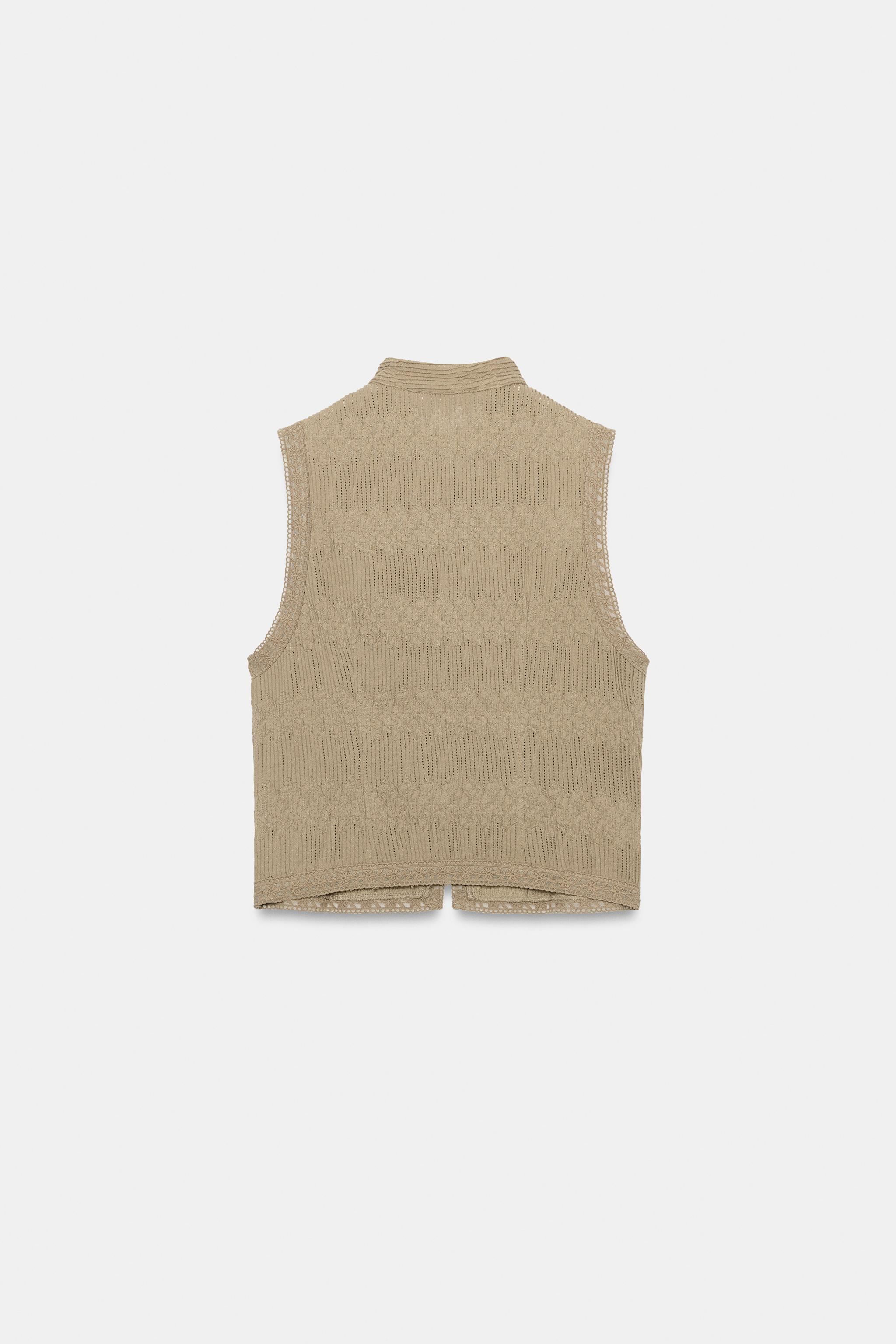 PLEATED VEST WITH FROG FASTENING