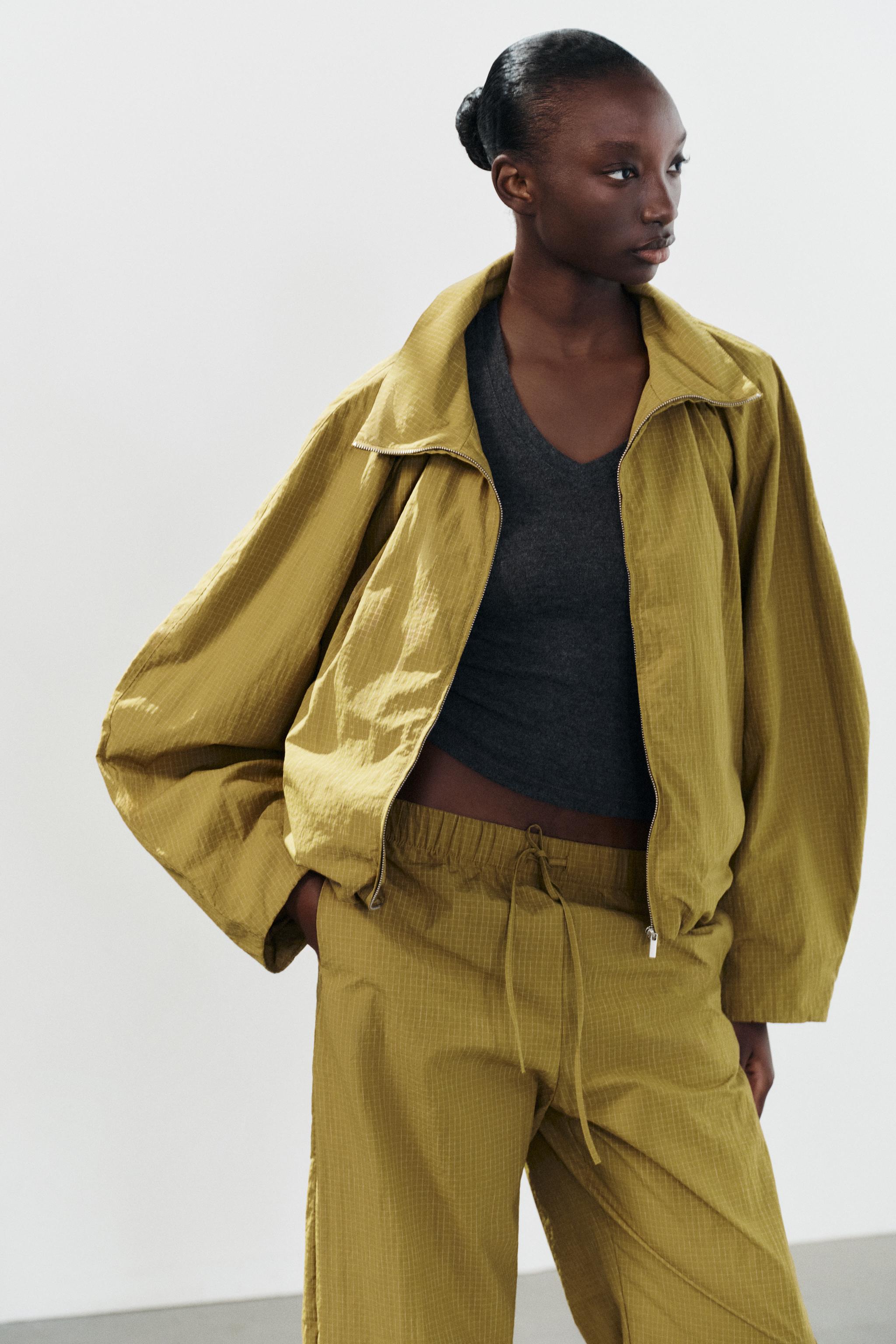 VESTE PLIS TISSU TECHNIQUE