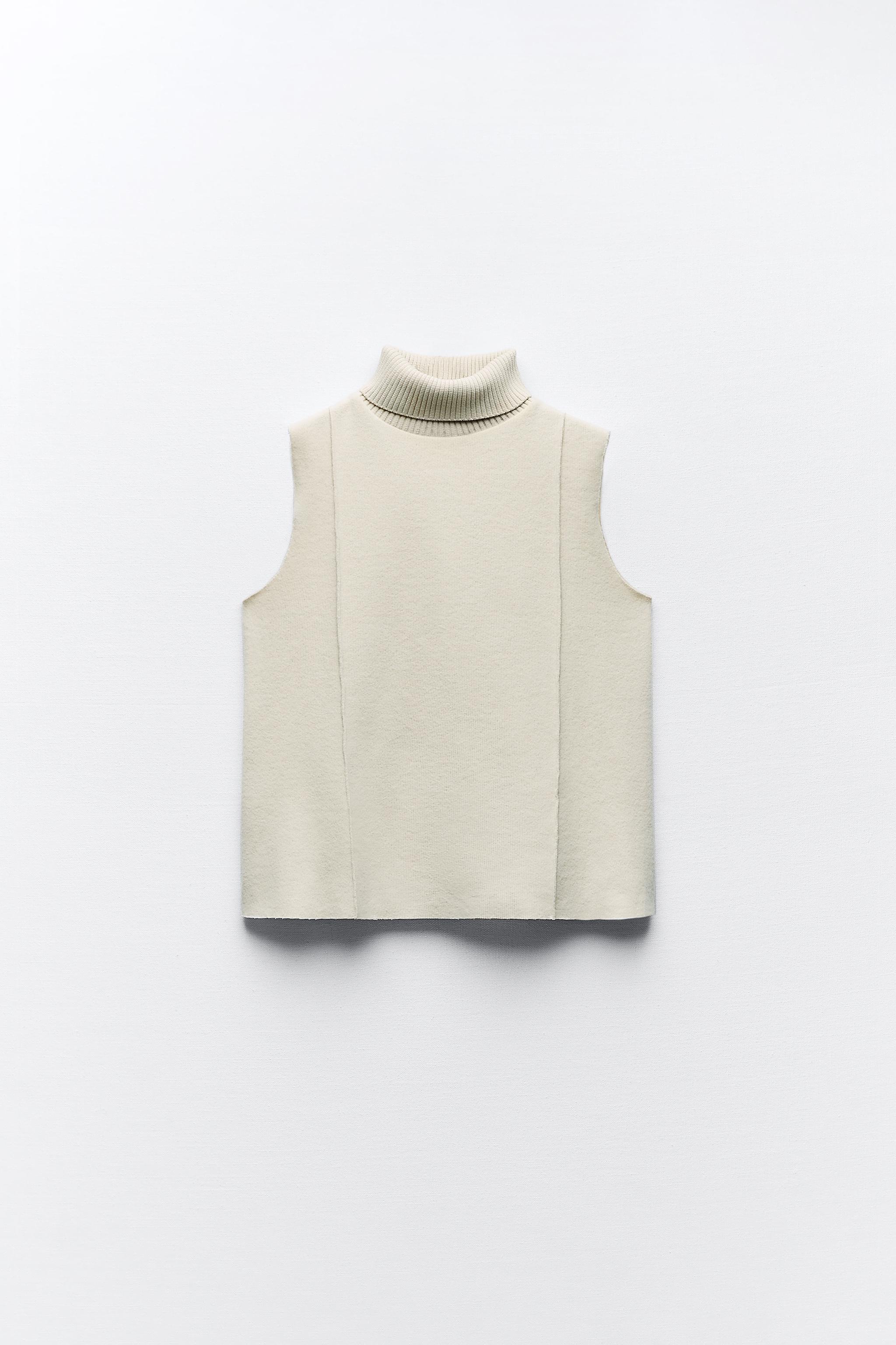 Cream sleeveless clearance turtleneck