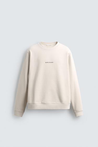 سويت شيرت بقصة عادية بنص مطبوع - أبيض مكسور الخاص بـ Zara