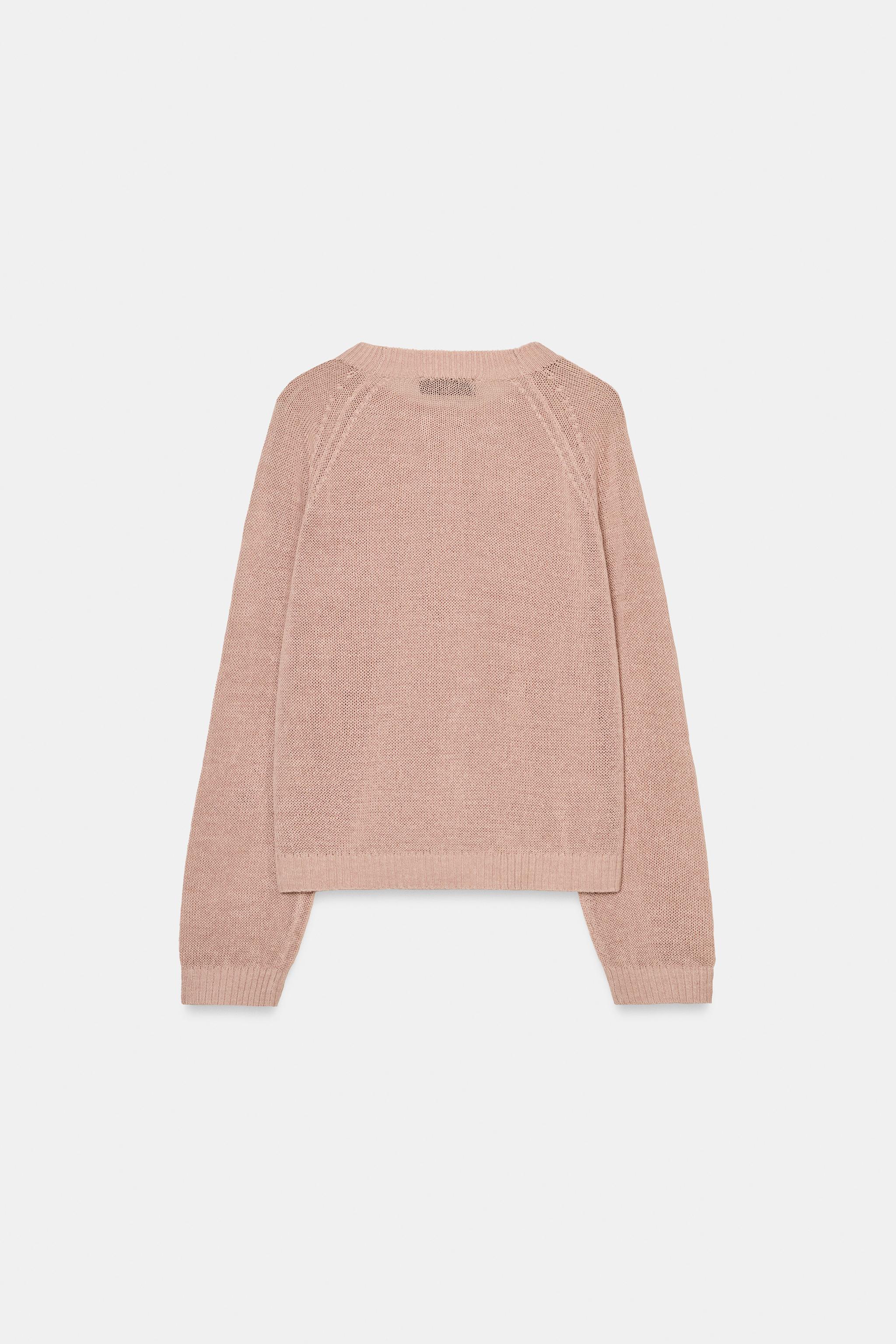 PULL EN MAILLE À BOUTONS