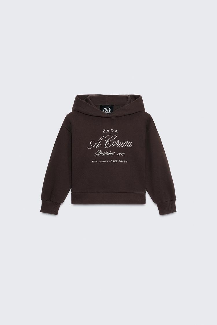 SWEAT À CAPUCHE INSCRIPTION BRODÉE 50TH ANNIVERSARY