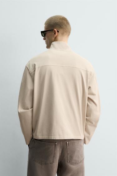 سويت شيرت بسحاب مغسول - أبيض مكسور by Zara