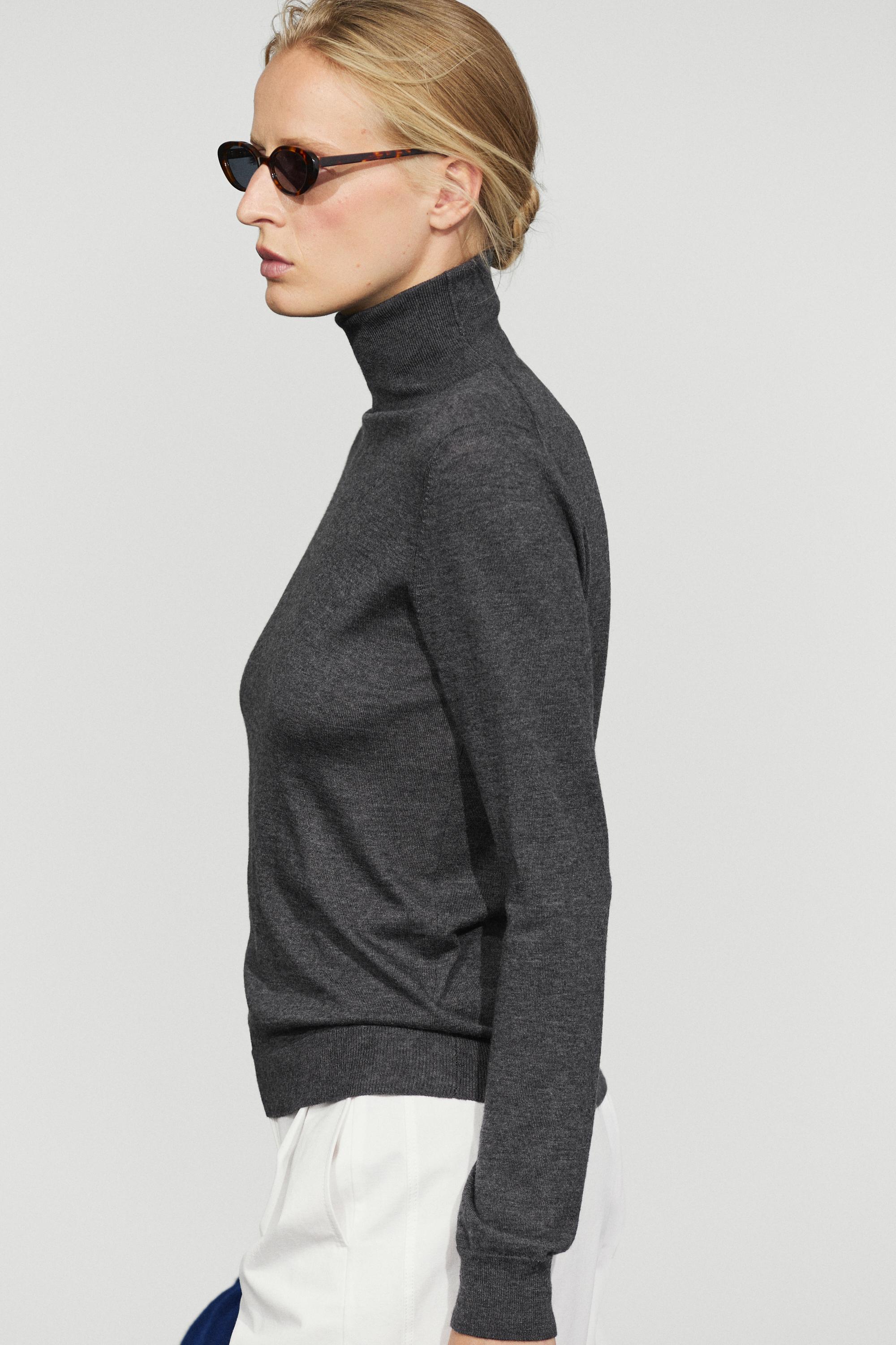 Wool-blend turtleneck knit sweater