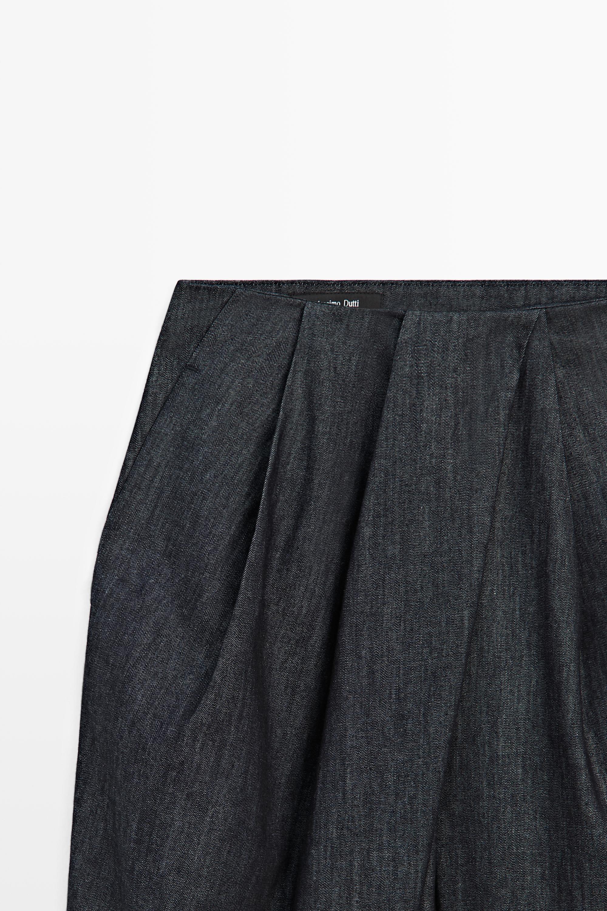 High-waist pants with crossover detail
