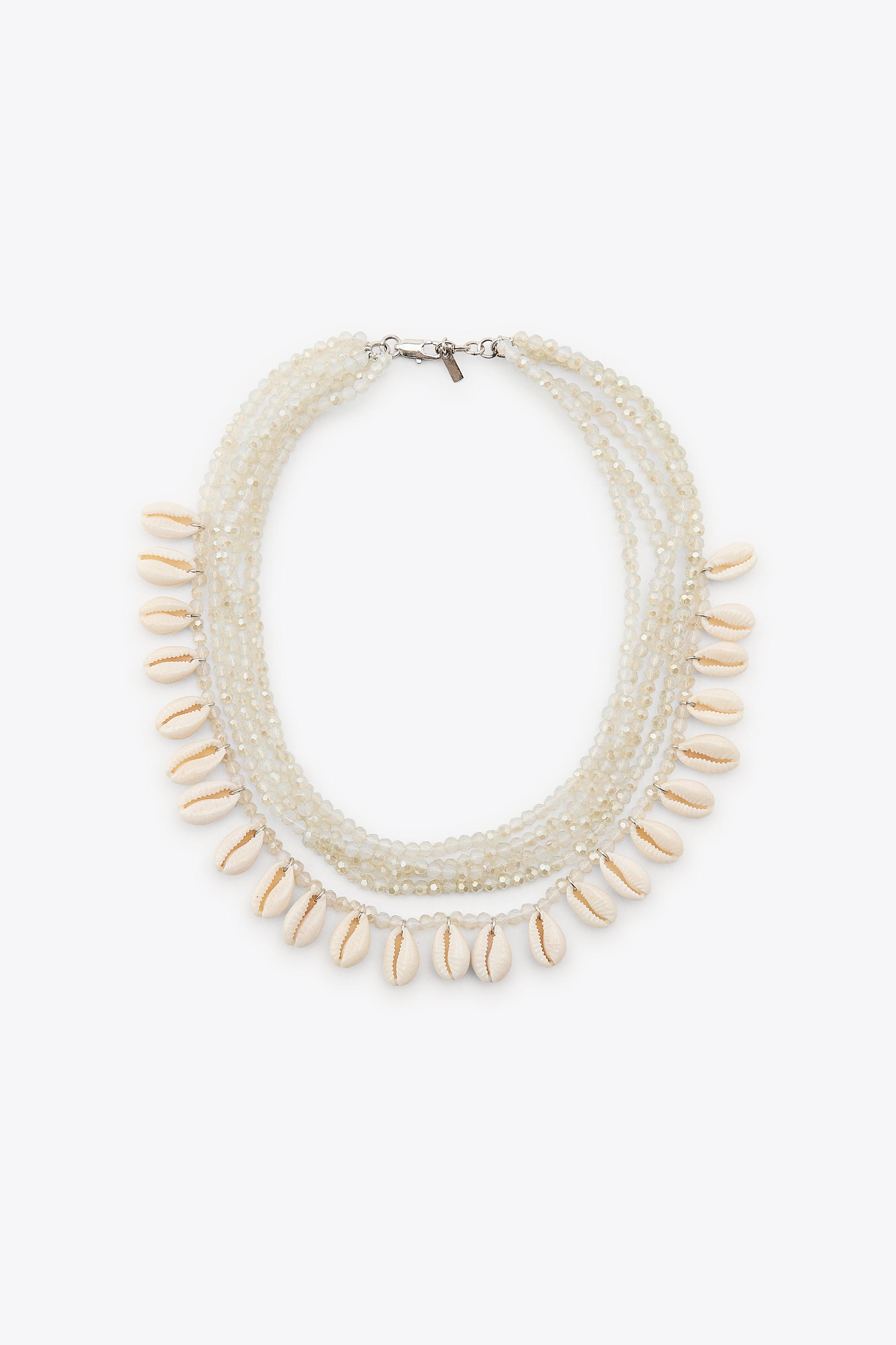 COLLIER BRILLANTS COQUILLAGES