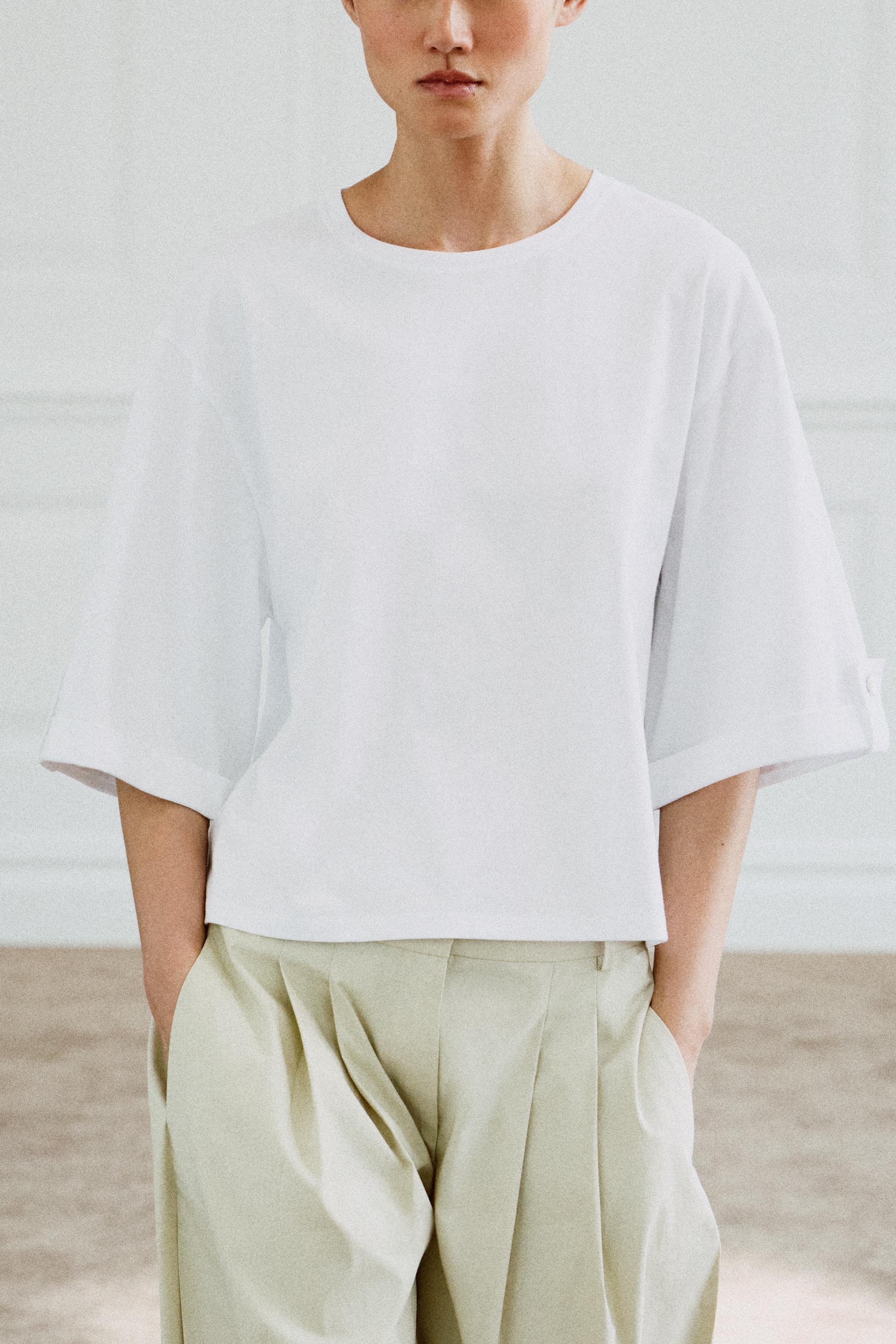 BUTTONED ASYMMETRIC T-SHIRT