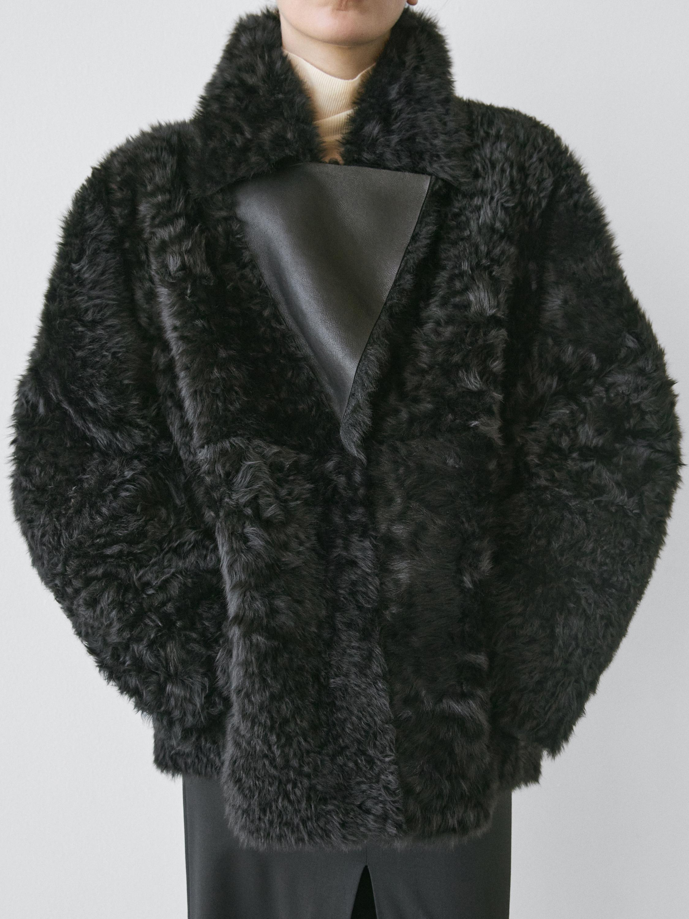 Sheepskin leather coat with lapel collar