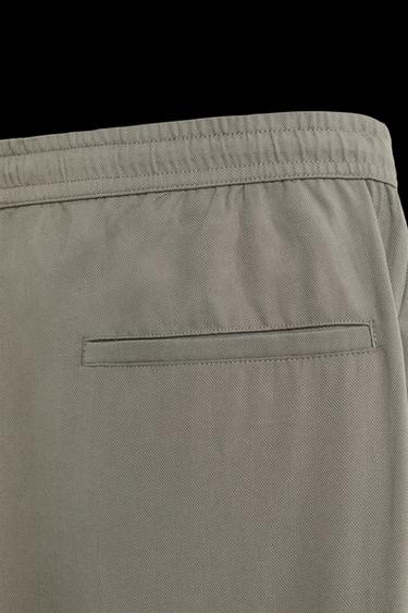 RELAXED FIT FLOWING TROUSERS - Light khaki by Zara