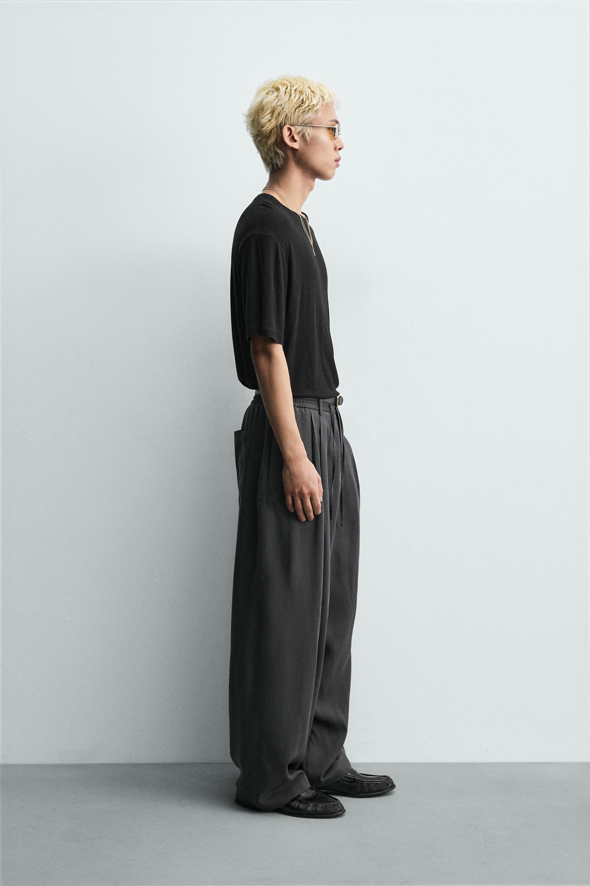 FLOWY PLEATED PANTS