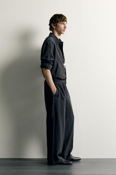 RELAXED FIT FLOWING PLEATED TROUSERS - Black by Zara