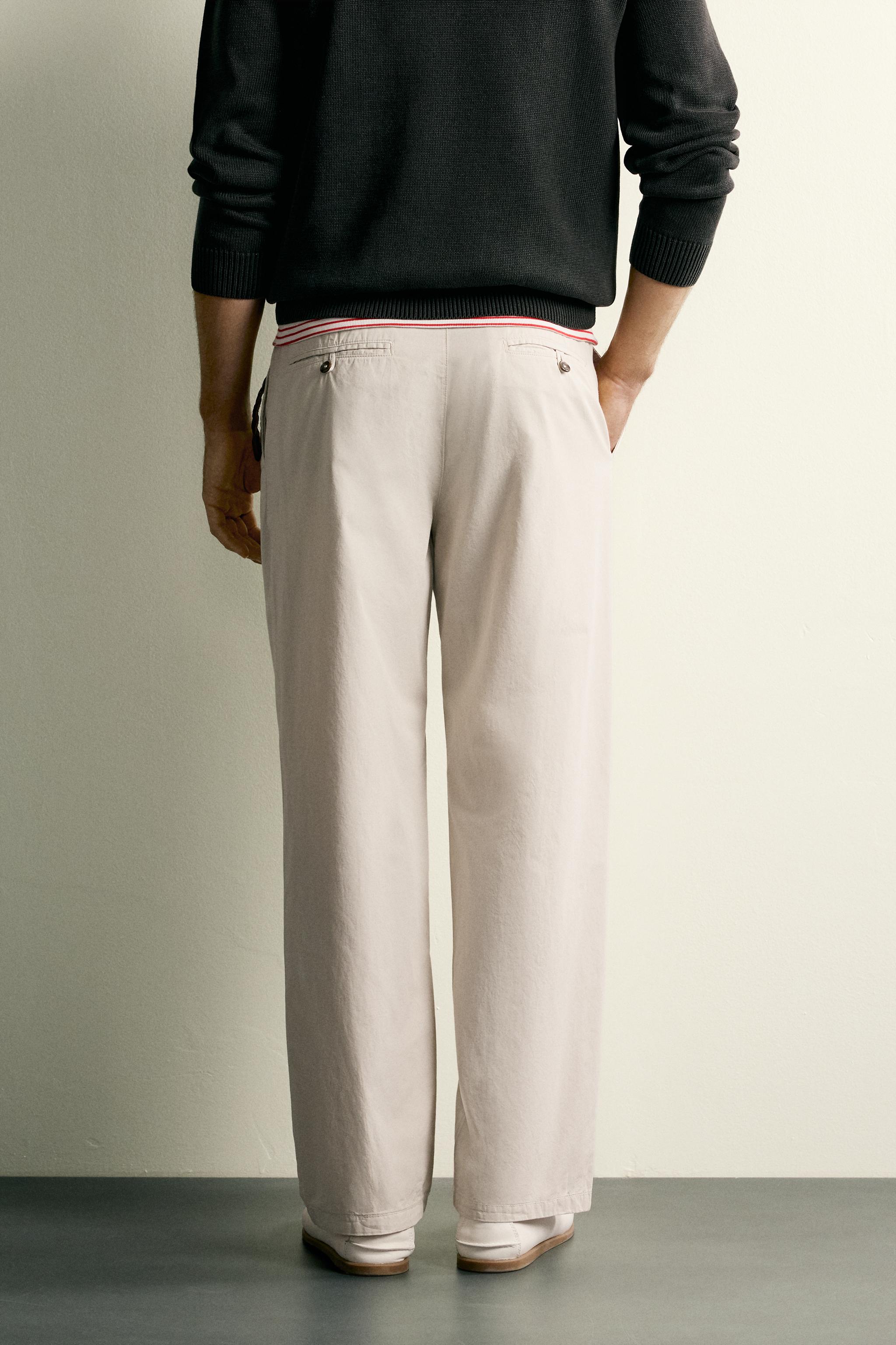 PLEATED STRAIGHT FIT CHINO PANTS