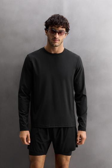 PERFORATED LONG SLEEVE T-SHIRT - Black by Zara