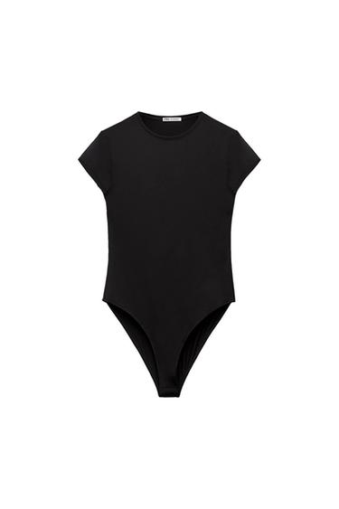 Black short-sleeved bodysuit on a white background, visible tag on the neck with text "ZARA".