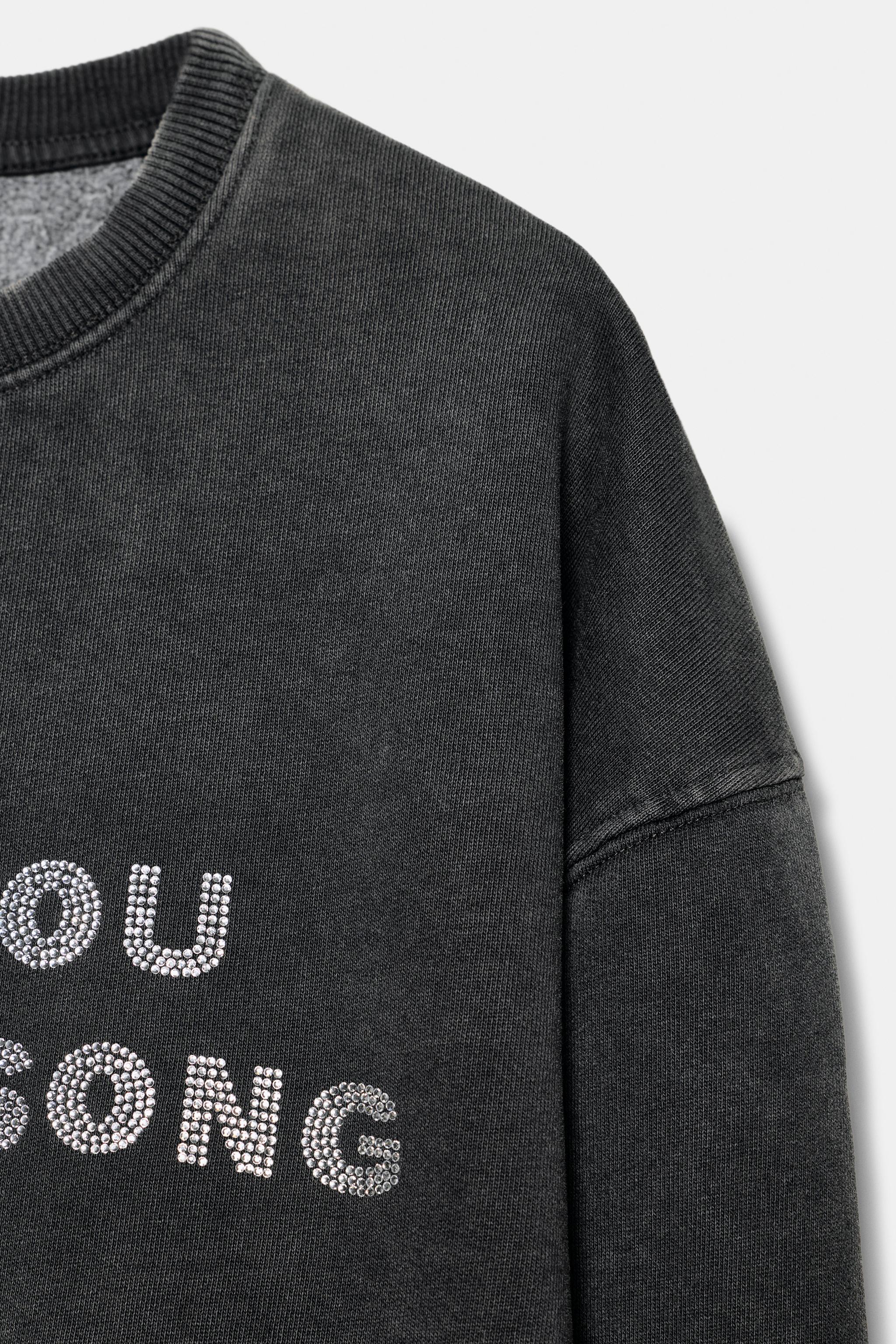 SWEAT DÉLAVÉ À INSCRIPTION
