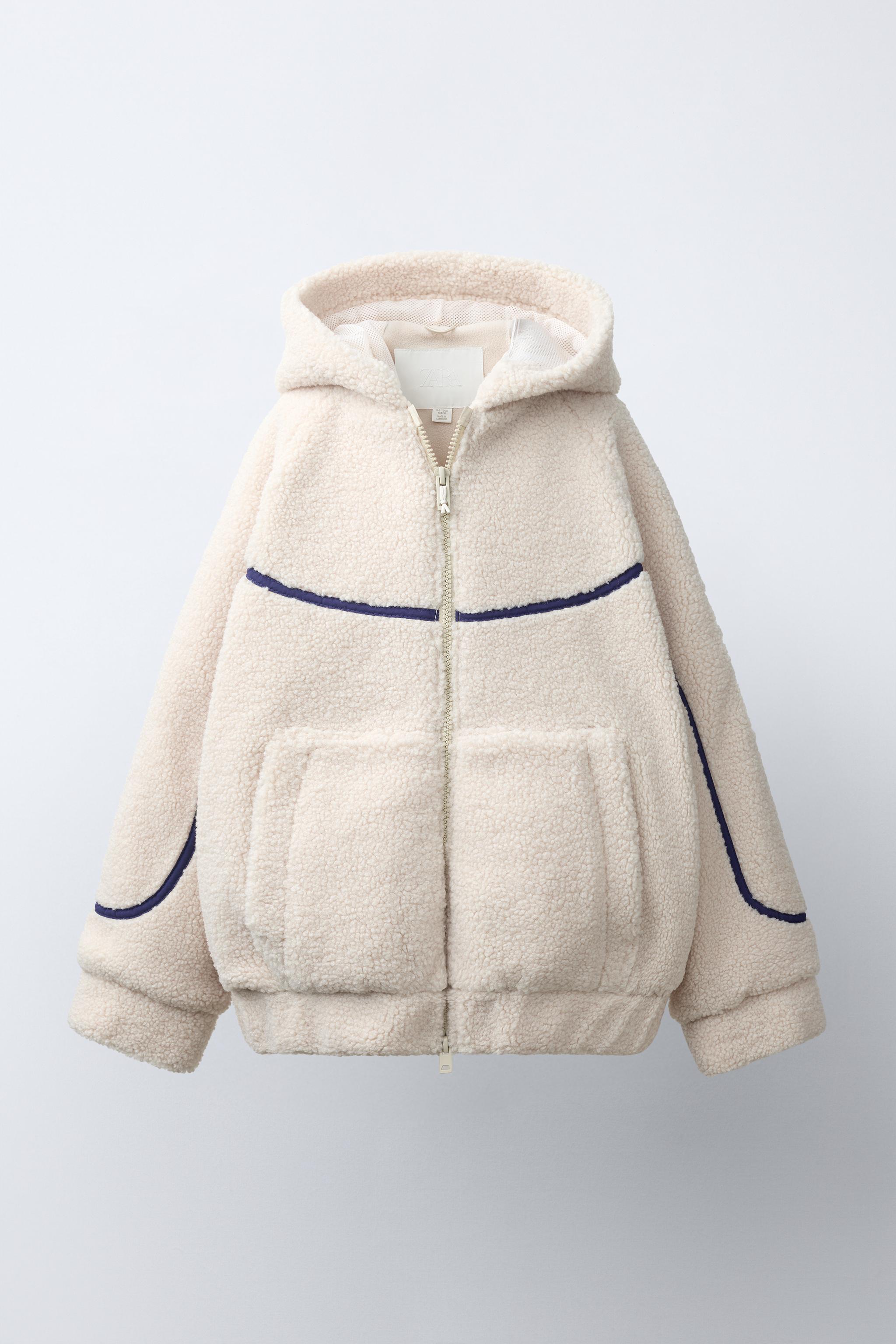 BLOUSON À CAPUCHE EFFET MOUTON
