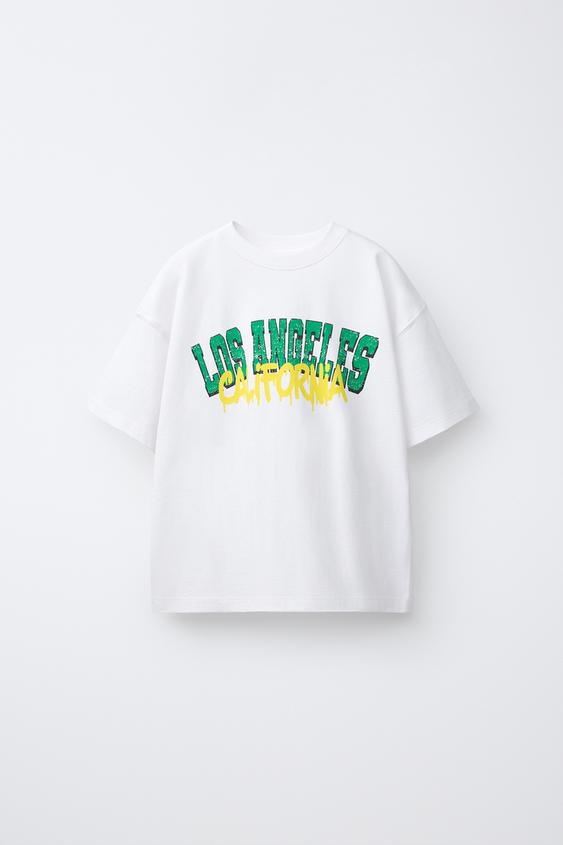 CAMISETA VARSITY GRAFFITI - Blanco de Zara - Imagen 0