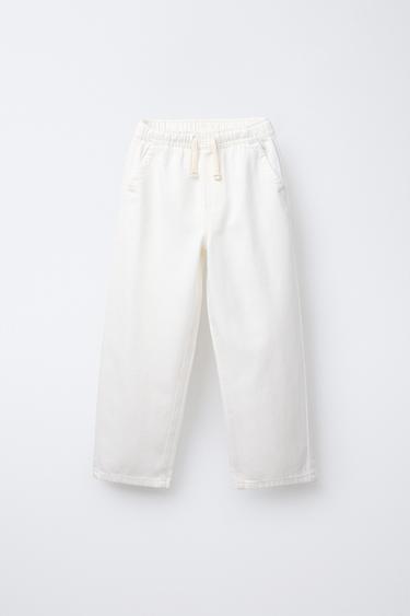 JEANS FLUIDO GOMAS - Crudo de Zara