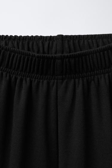 ENSEMBLE SWEAT ET PANTALON EN MOLLETON À JAMBES LARGES UNIE - Noir de Zara - Image 6