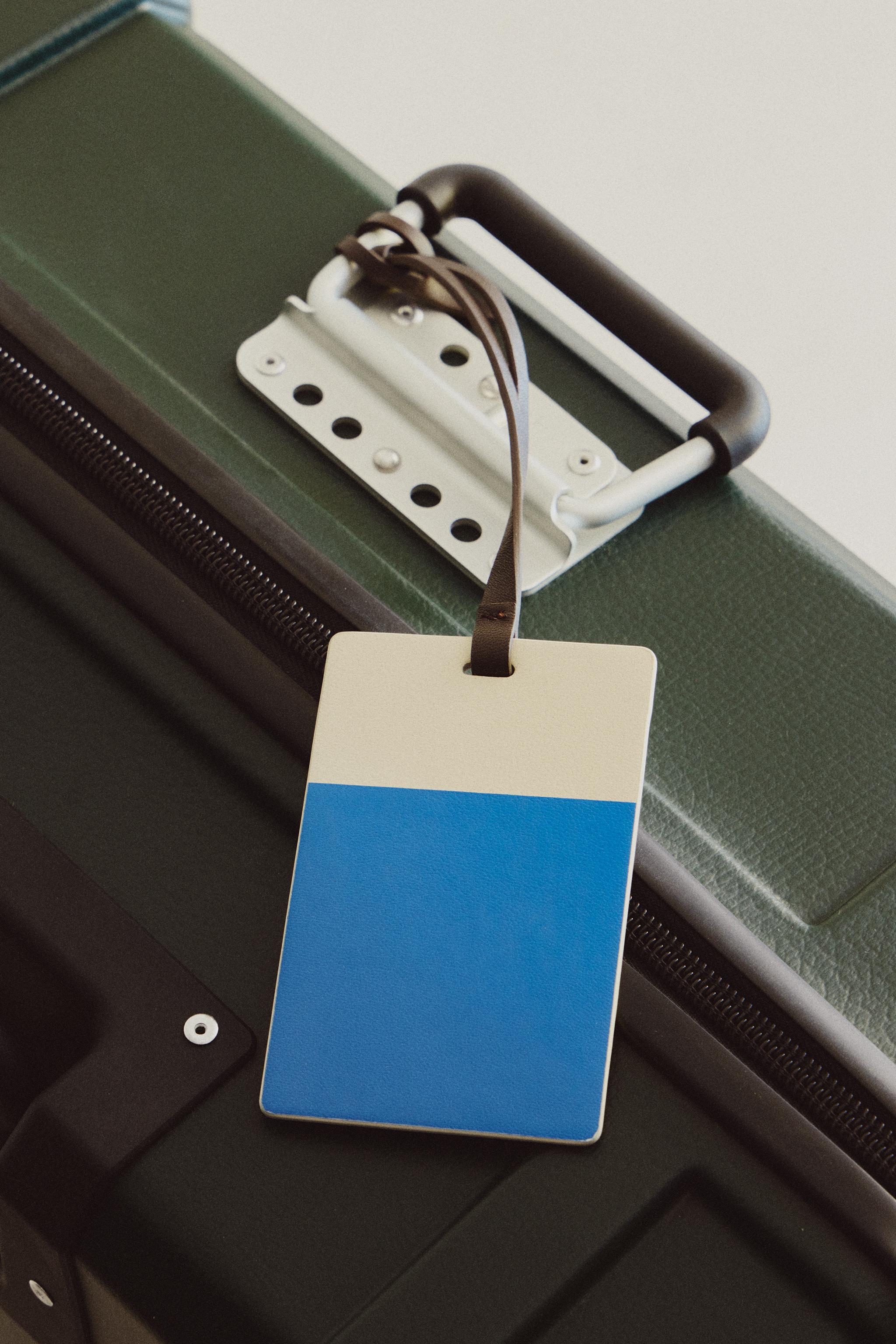 ÉTIQUETTE BAGAGE CUIR