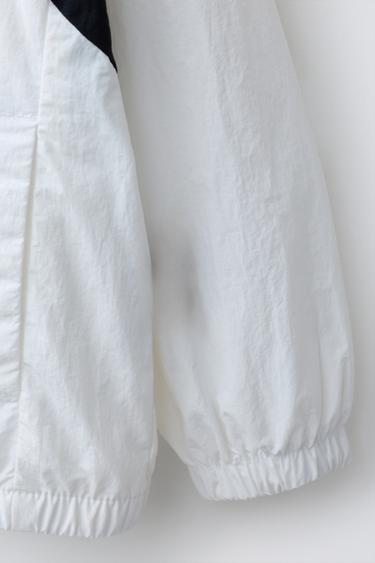 LIGHTWEIGHT RAINCOAT WITH SLOGAN - Black / White by Zara - Image 4