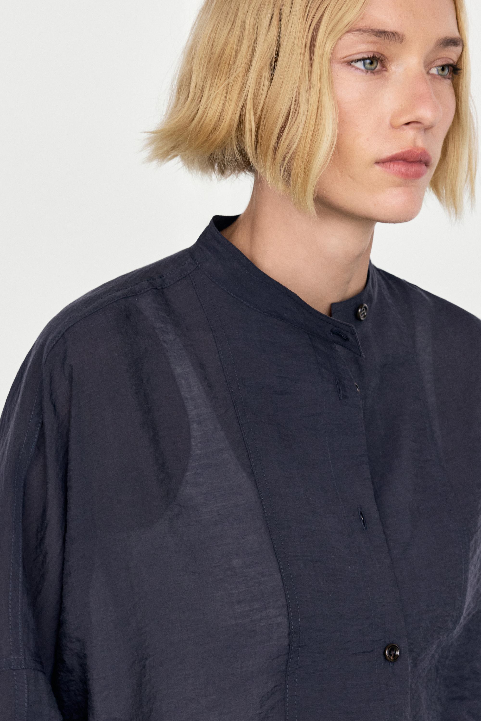 Stand collar bomber jacket with button details