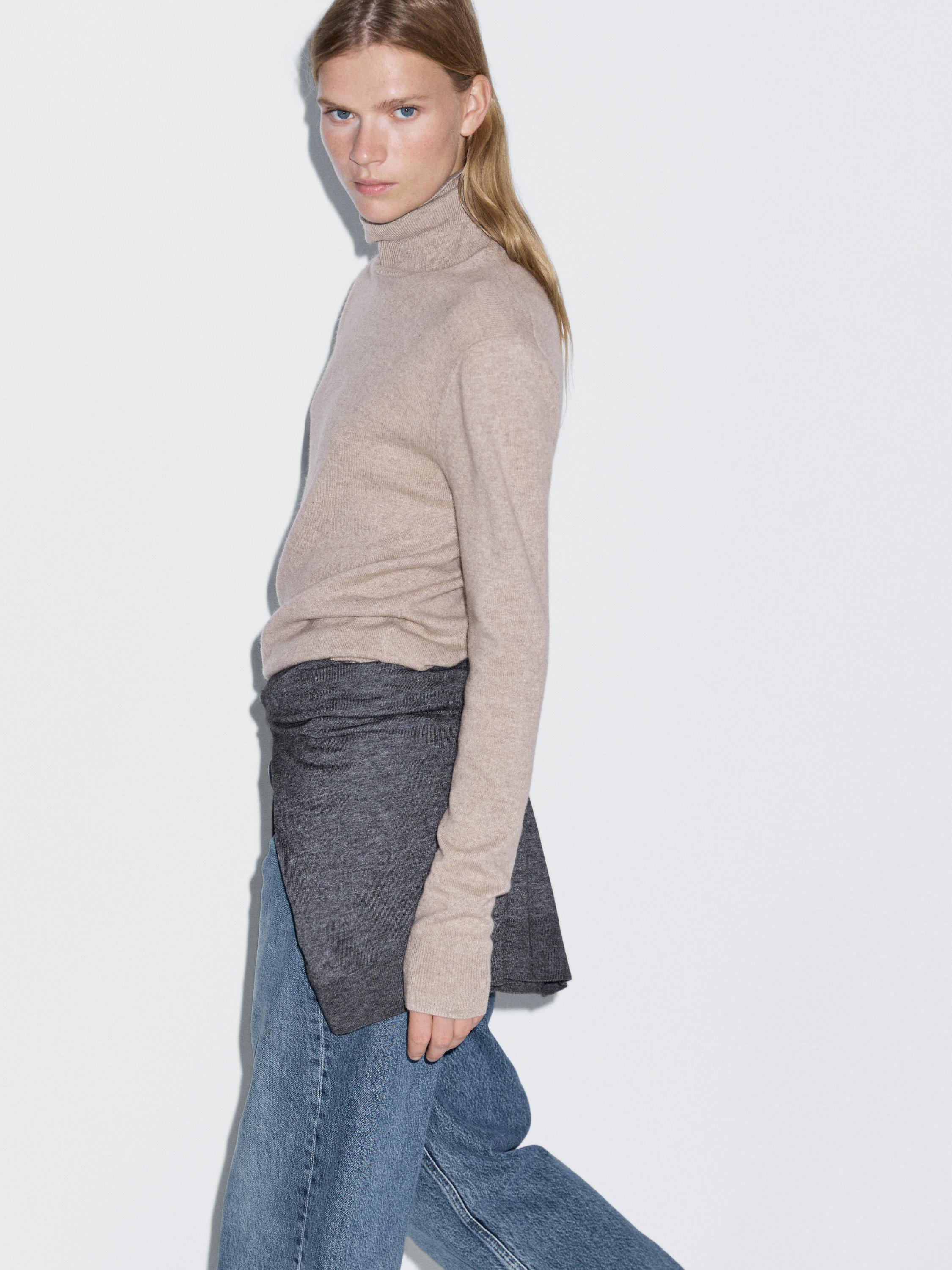 Wool blend knit sweater with high neck