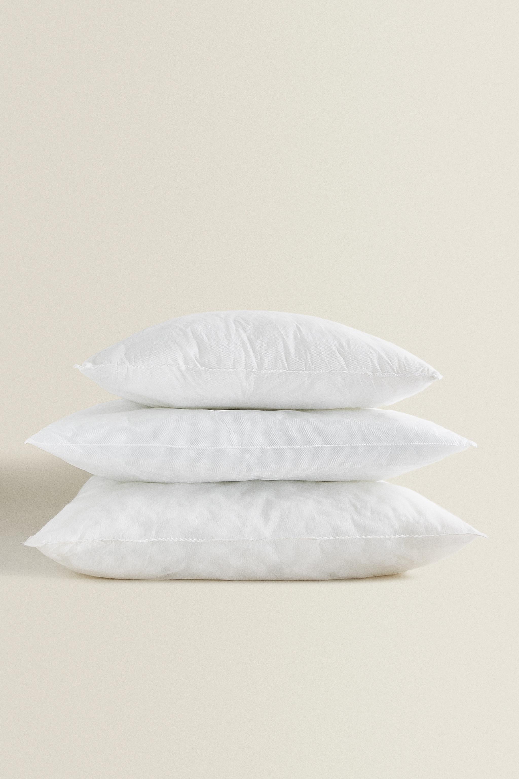 Zara white cheap feather cushion