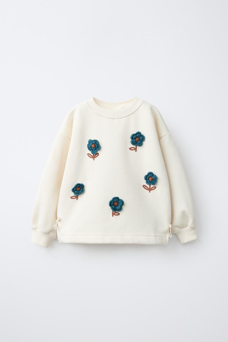 Sudadera flores punto
