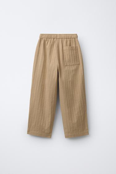STRAIGHT TEXTURED PLEATED TROUSERS - Ochre by Zara - Image 1