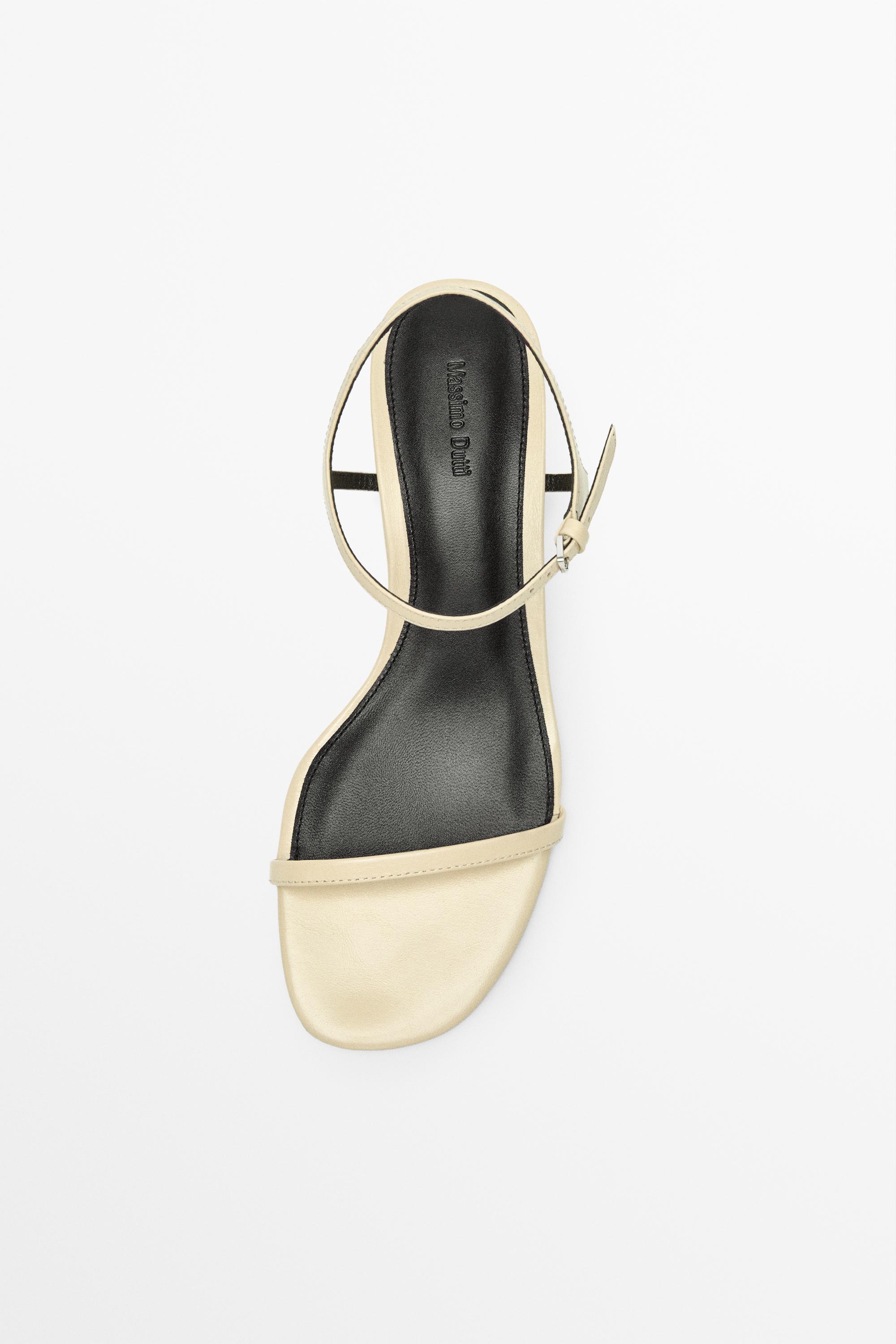 Sandale en cuir à brides compensées