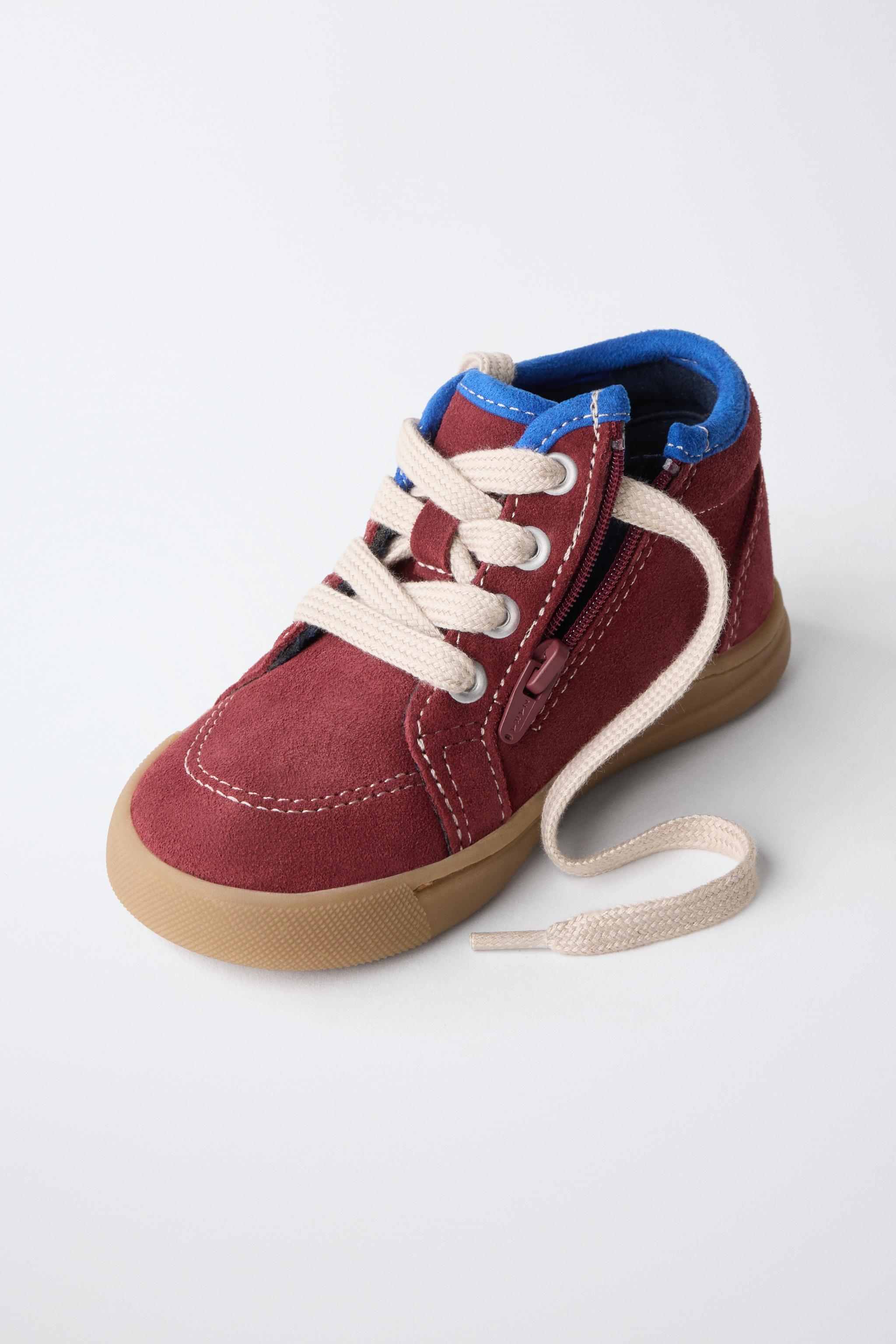 BASKETS MONTANTES EN CUIR