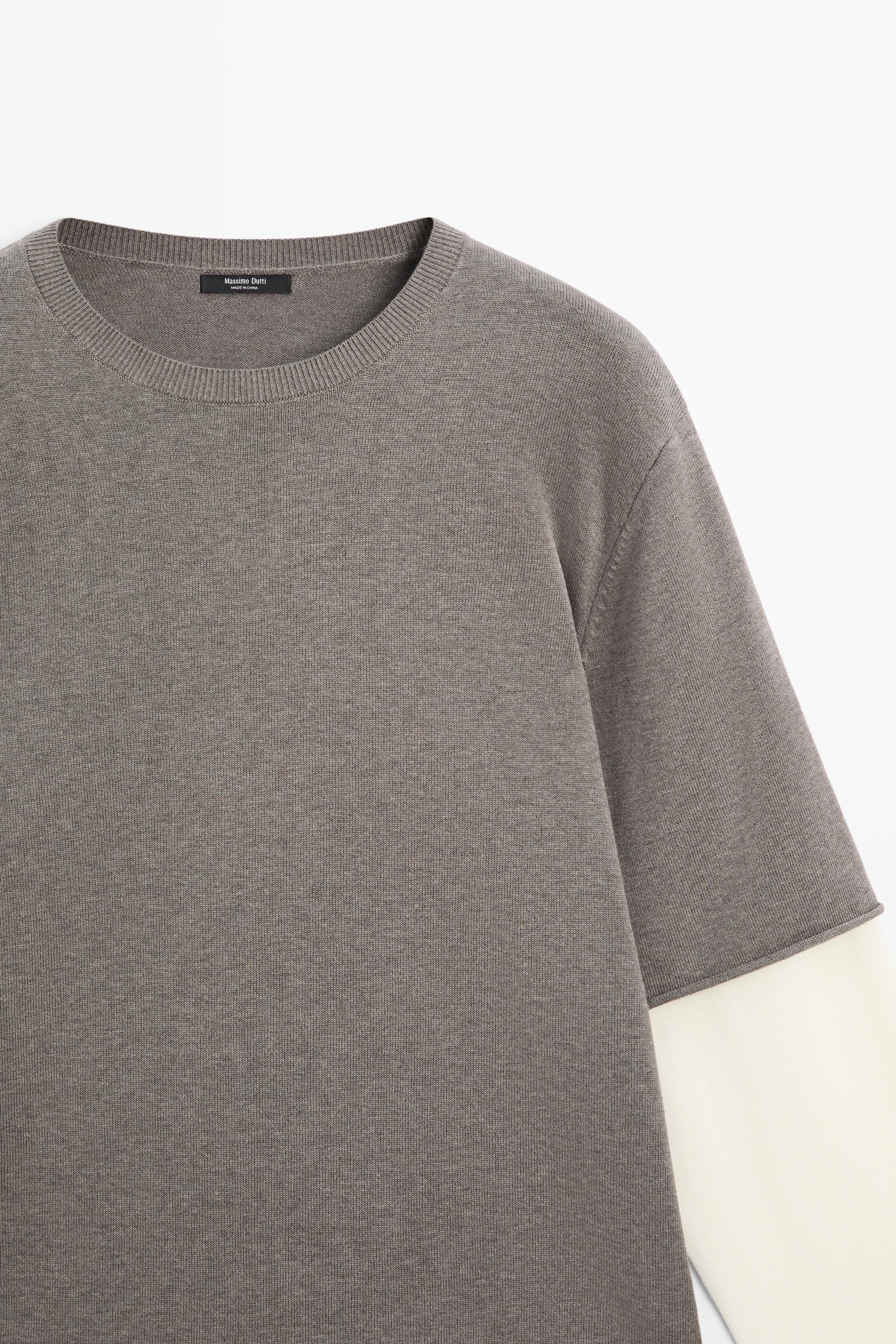 Oversize knit sweater with double sleeve detail