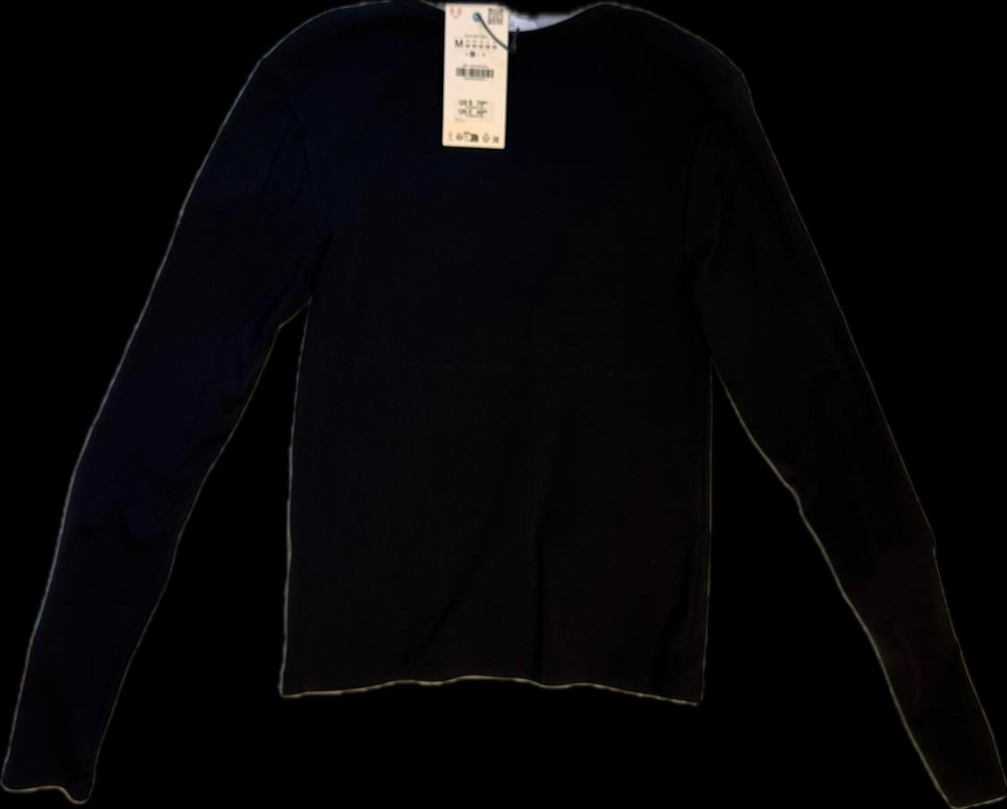 Black long-sleeve crew neck t-shirt with a neck label, shown flat on a black background.