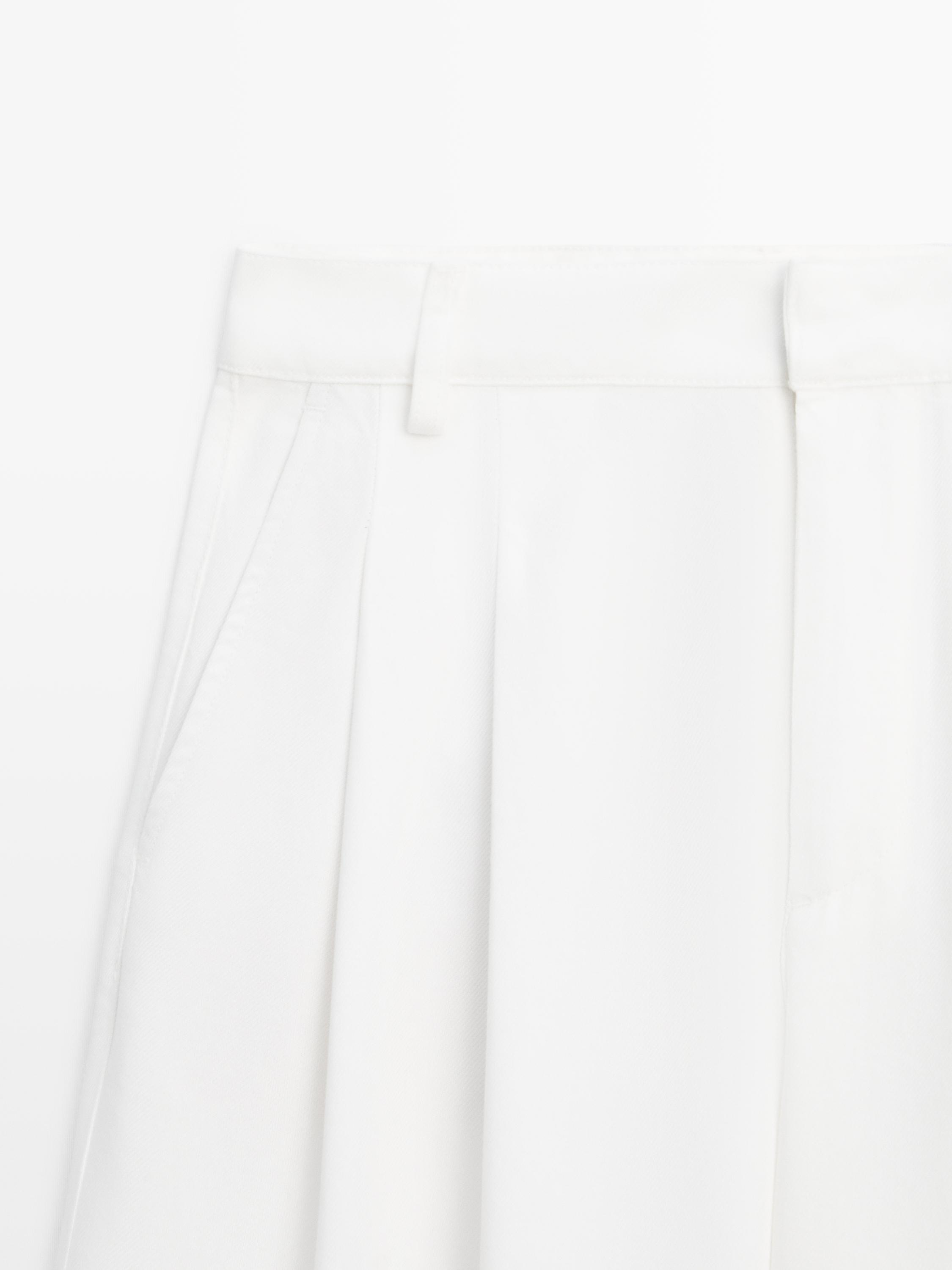 Pantalon wide leg à plis