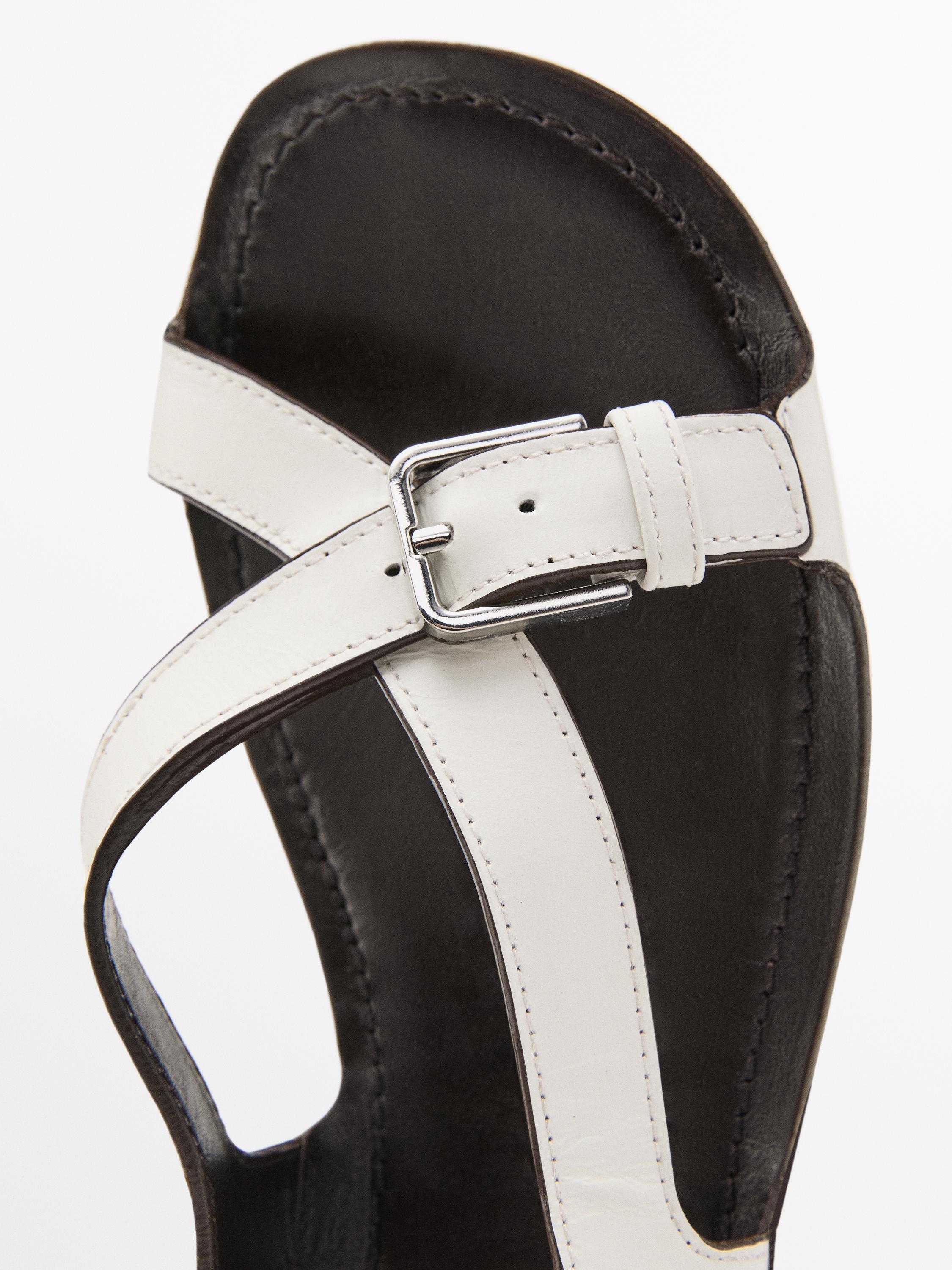 Sandales plates cuir boucles