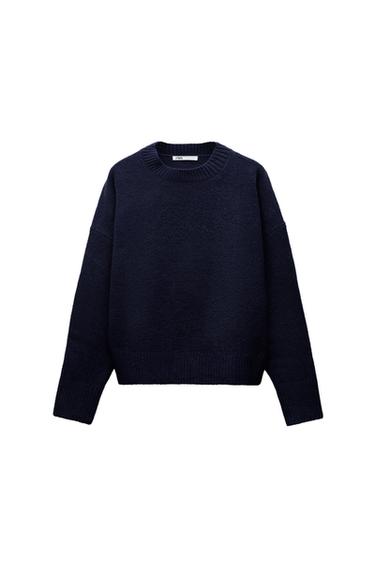 Front view of a navy blue jumper with a crew neck and long sleeves.