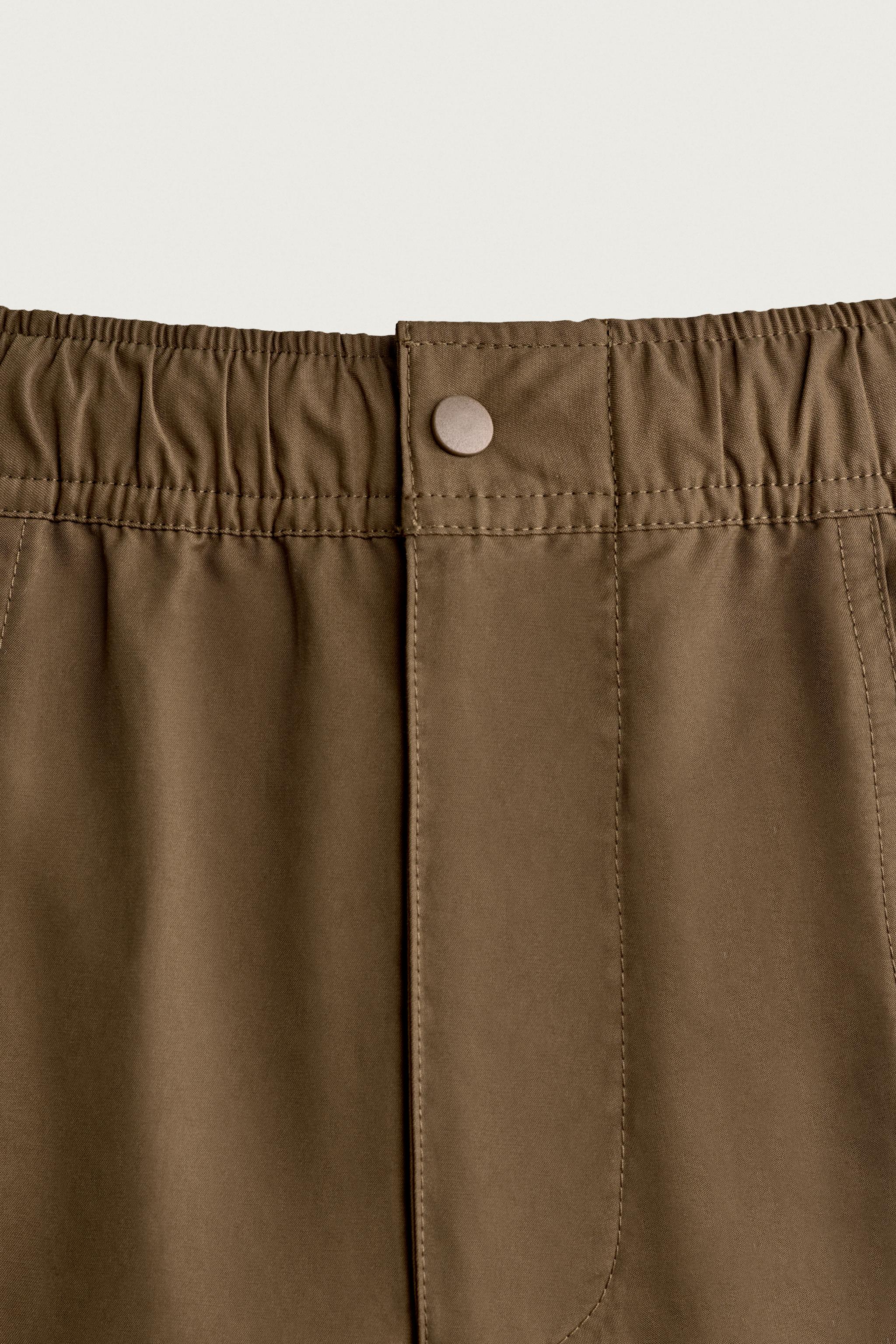 SEAMED SWIM SHORTS