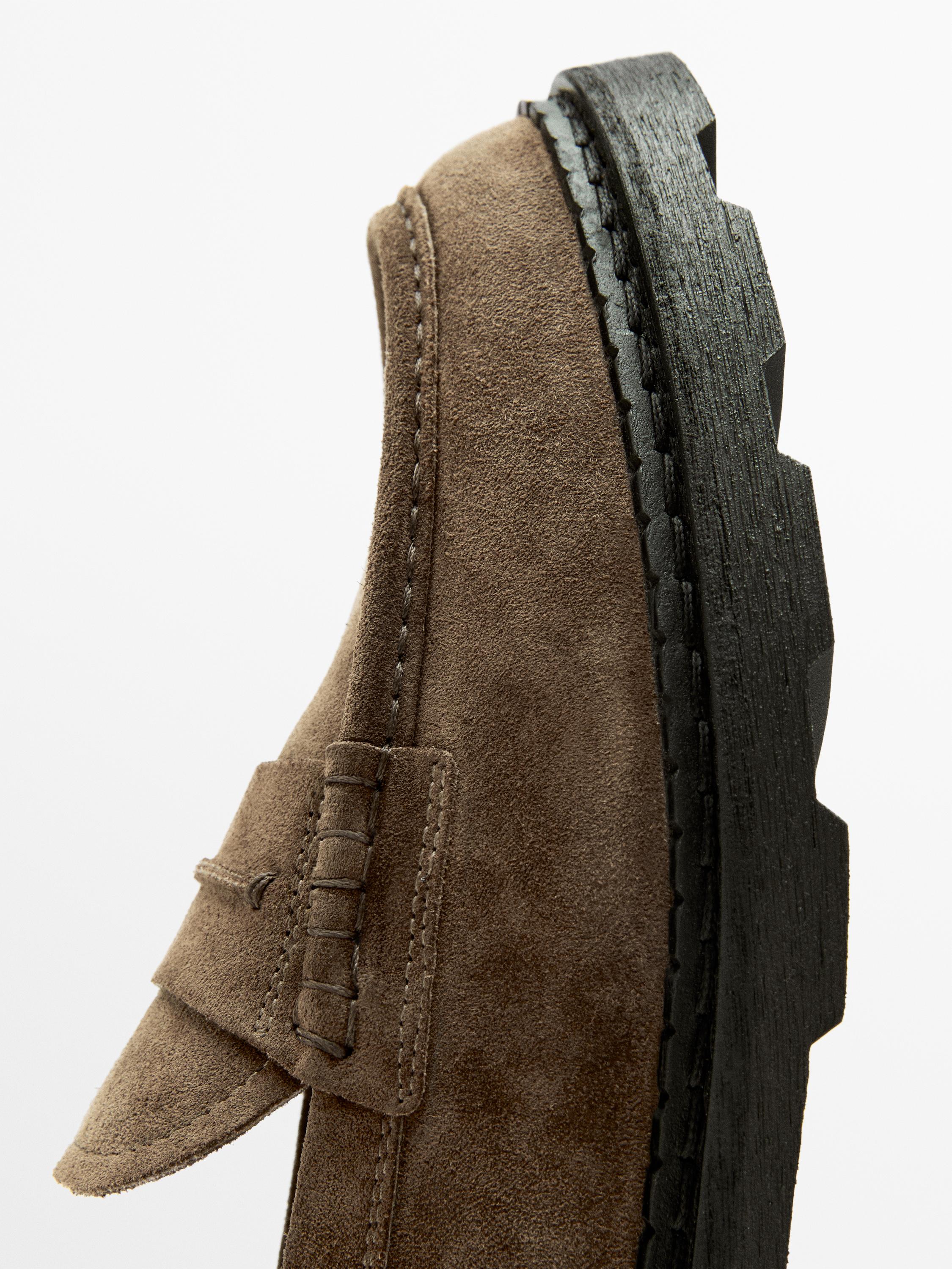 Leather track-sole loafers with penny strap