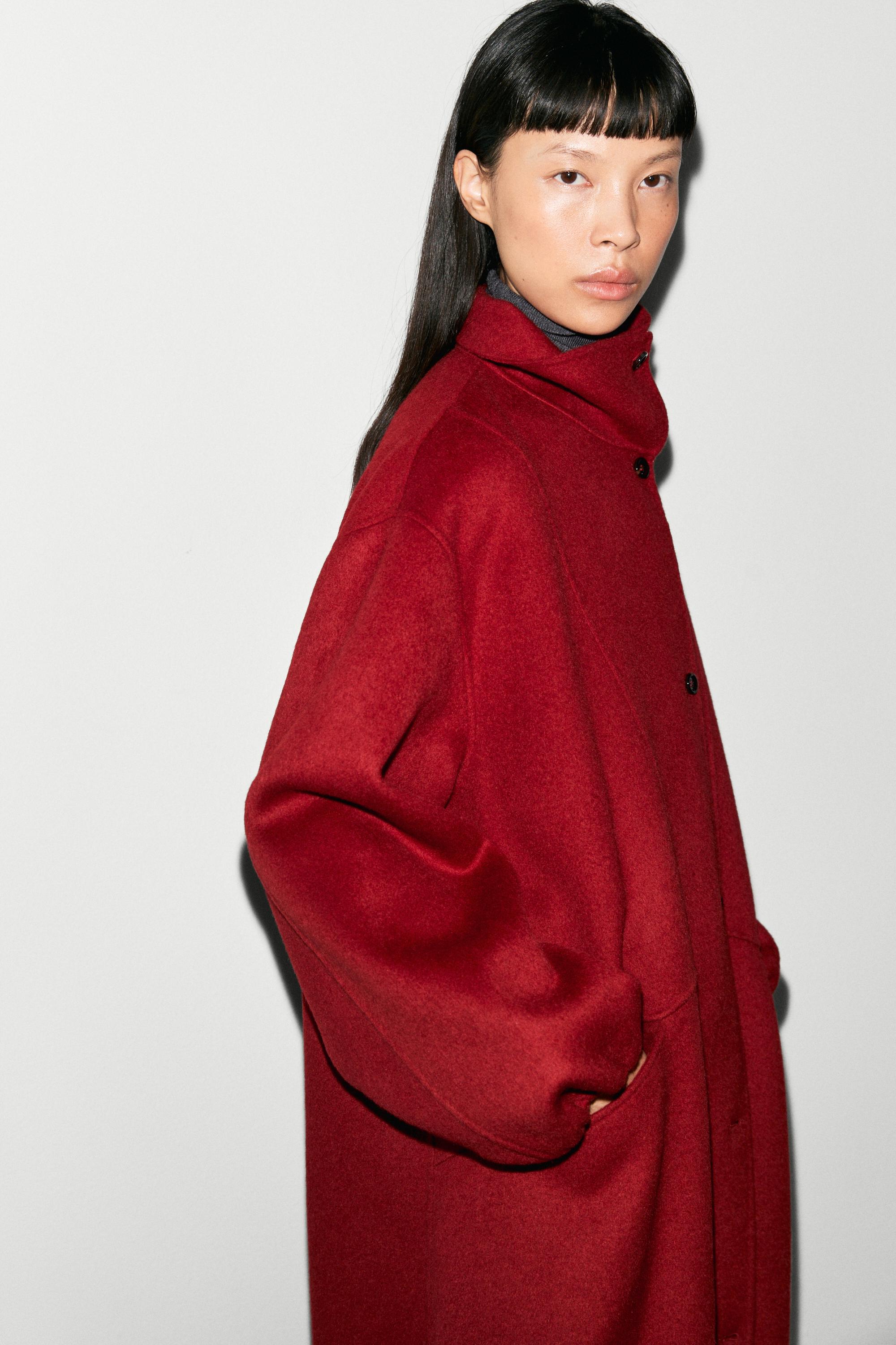 Long coat with asymmetrical collar detail