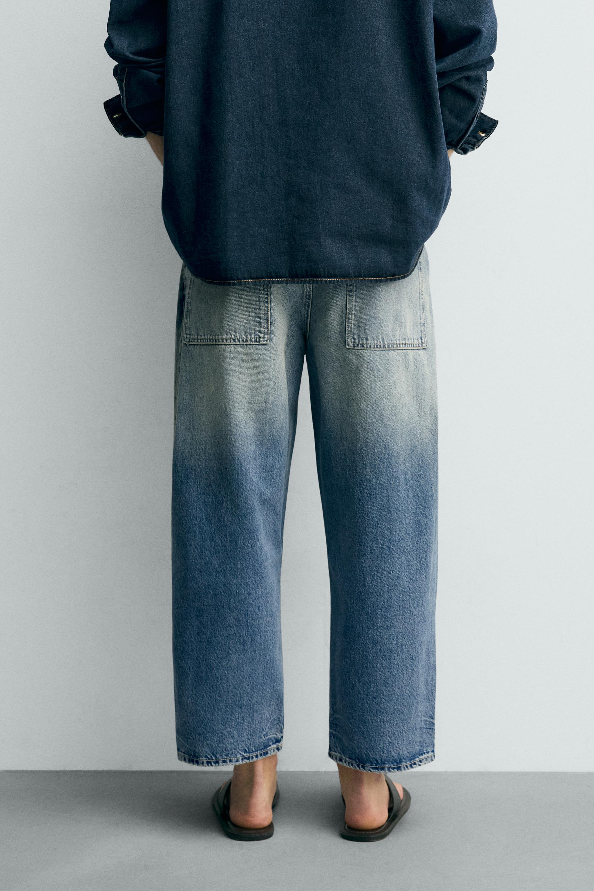 TAPERED WIDE FIT JEANS