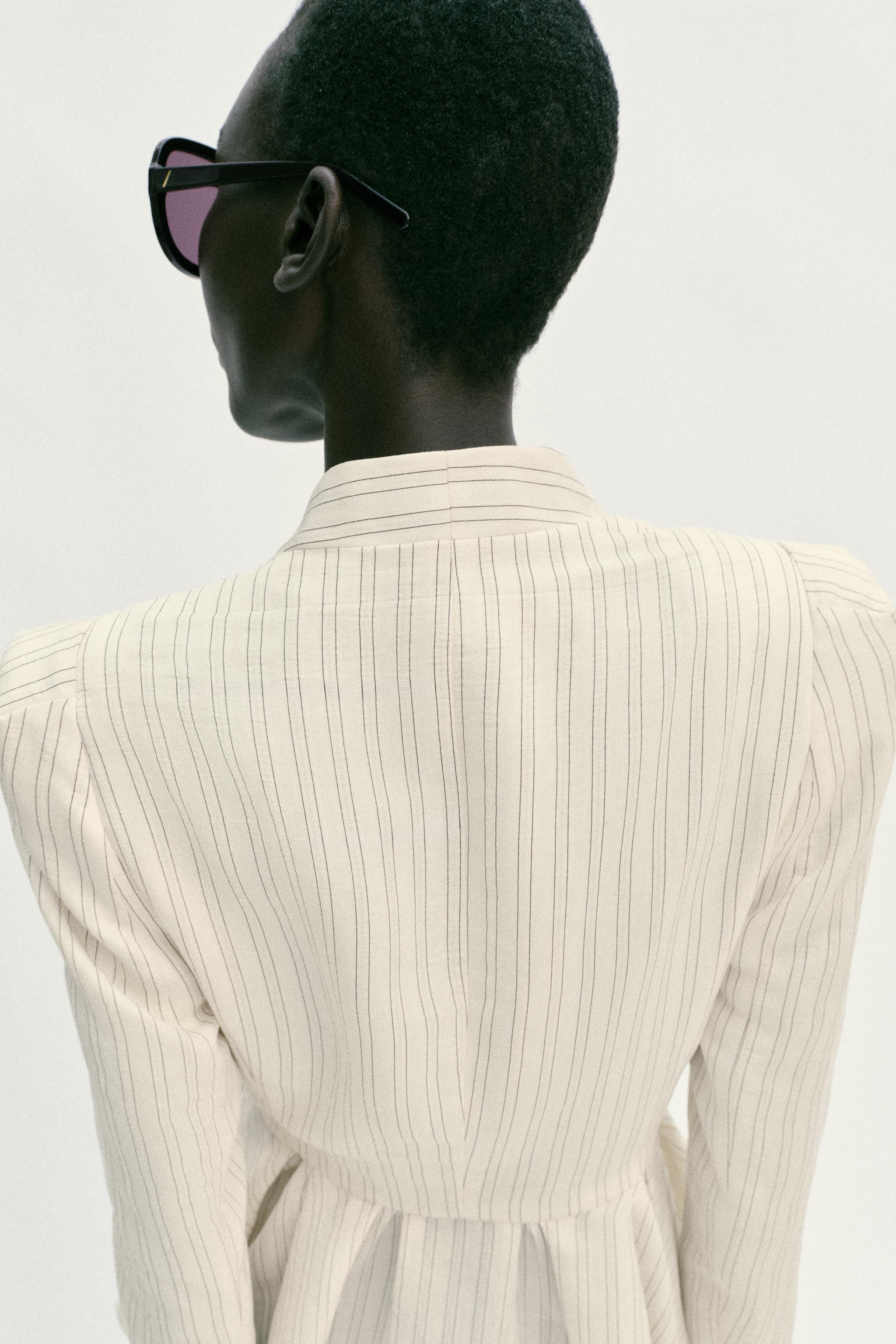 STRIPED PEPLUM BLAZER